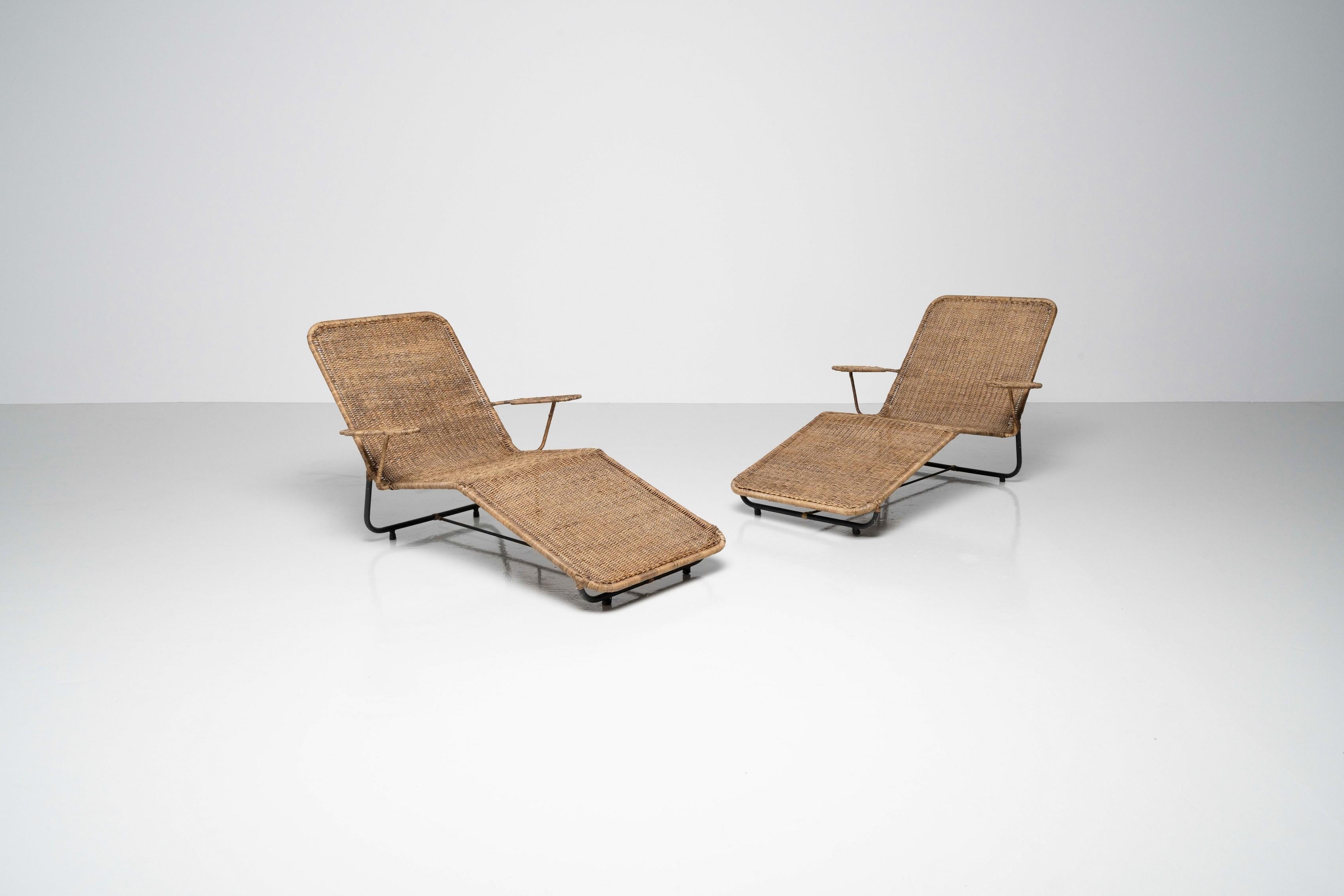 A beautiful pair of lounge chairs in rattan by Carlo Hauner and Martin Eisler, made by Forma Móveis in Brazil in 1955. The chairs are in fully original condition and have never been seperated. The overall patina looks fantastic, and the chairs have