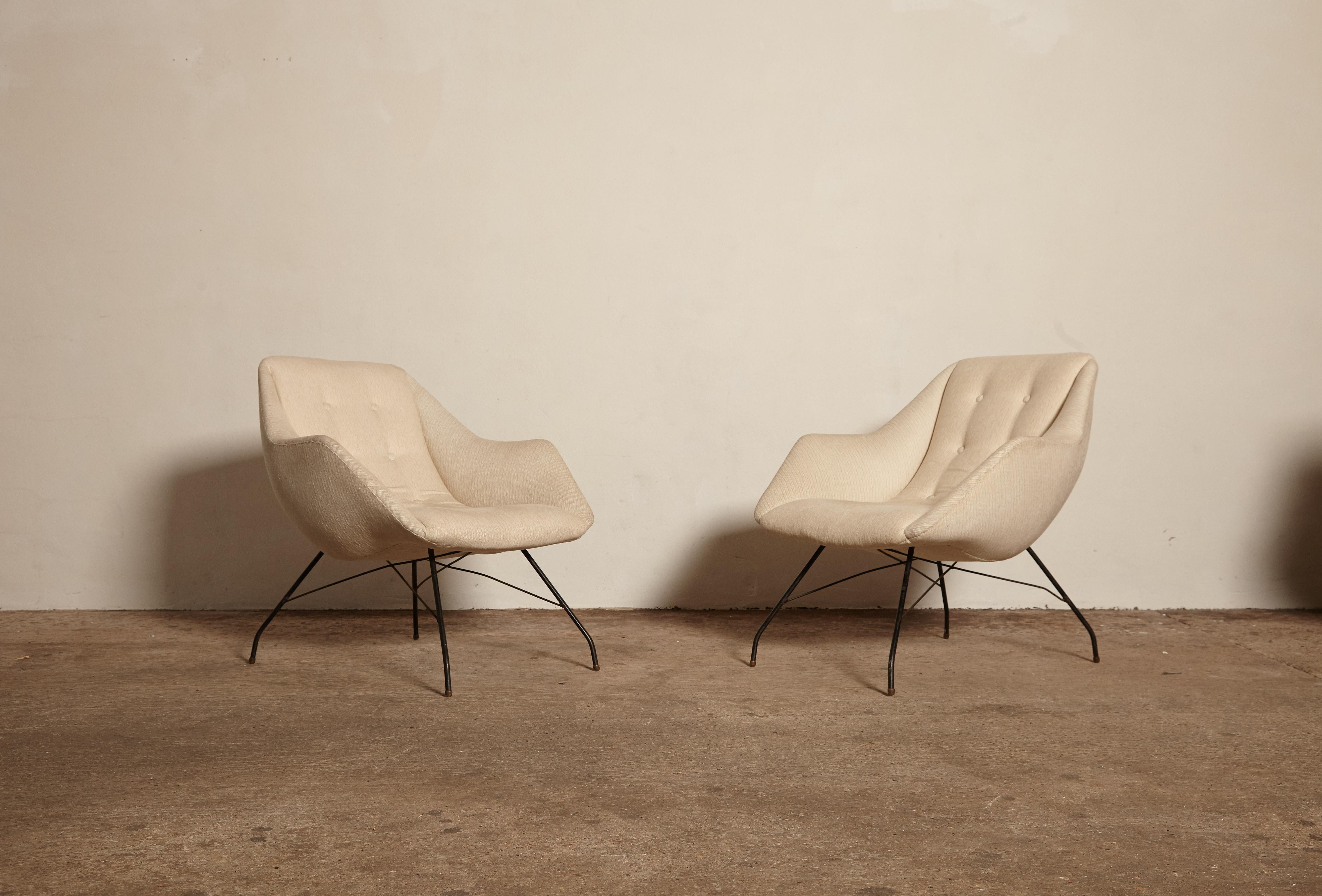 A rare authentic pair of Carlo Hauner and Martin Eisler Shell (Concha) lounge chairs, manufactured by Forma Brazil, 1950s. Measures: 78 H x 73 W x 76 D cm. In good original condition, some minor paint loss to steel legs, structurally sound, original