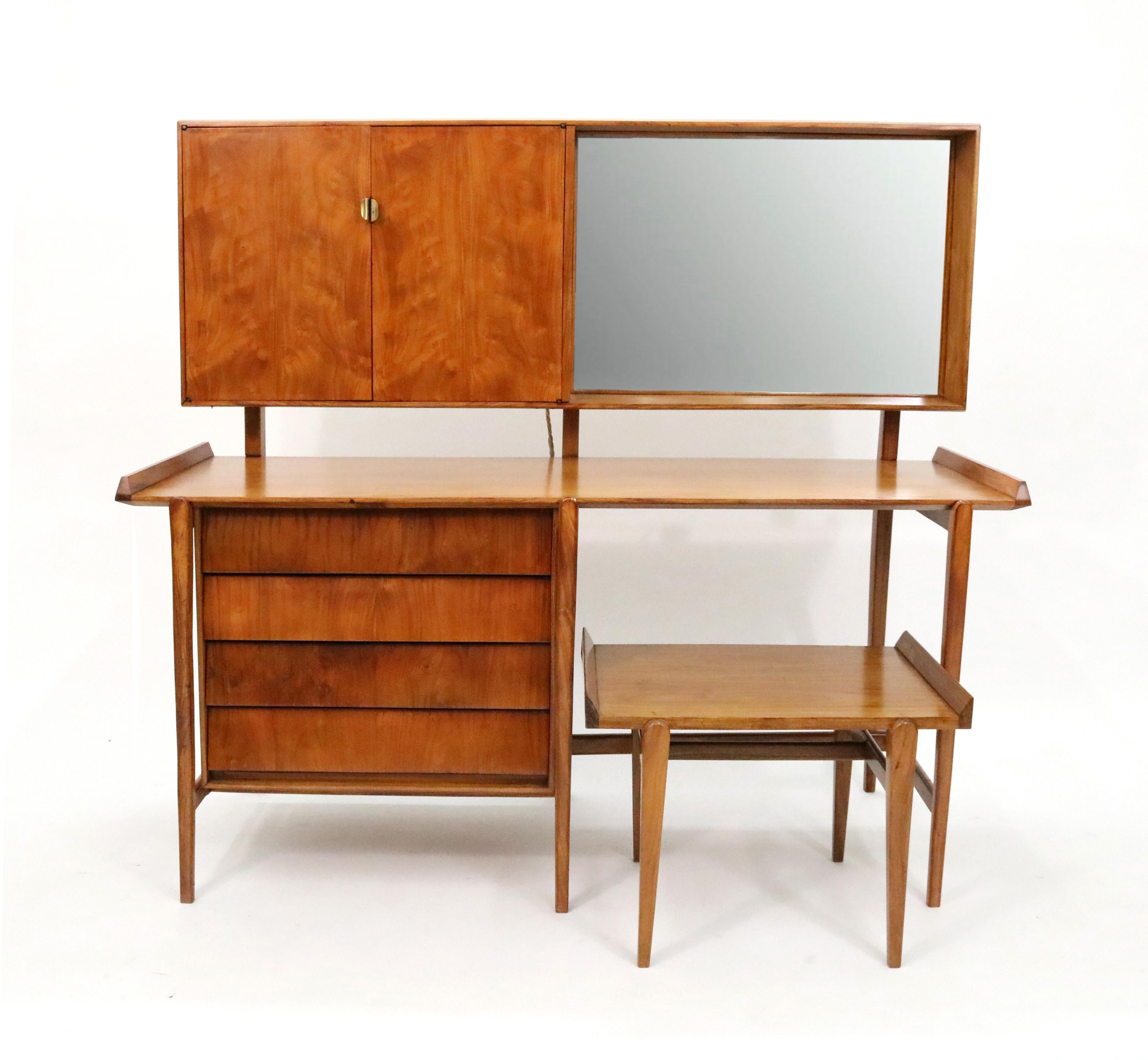 1950s vanity with bench by Carlo Hauner and Martin Eisler for Móveis e Objetos de Arte of Brazil in two beautifully contrasting and complementary exotic woods. 

A mirror light is encased in the side of the upper cabinet, currently fitted with