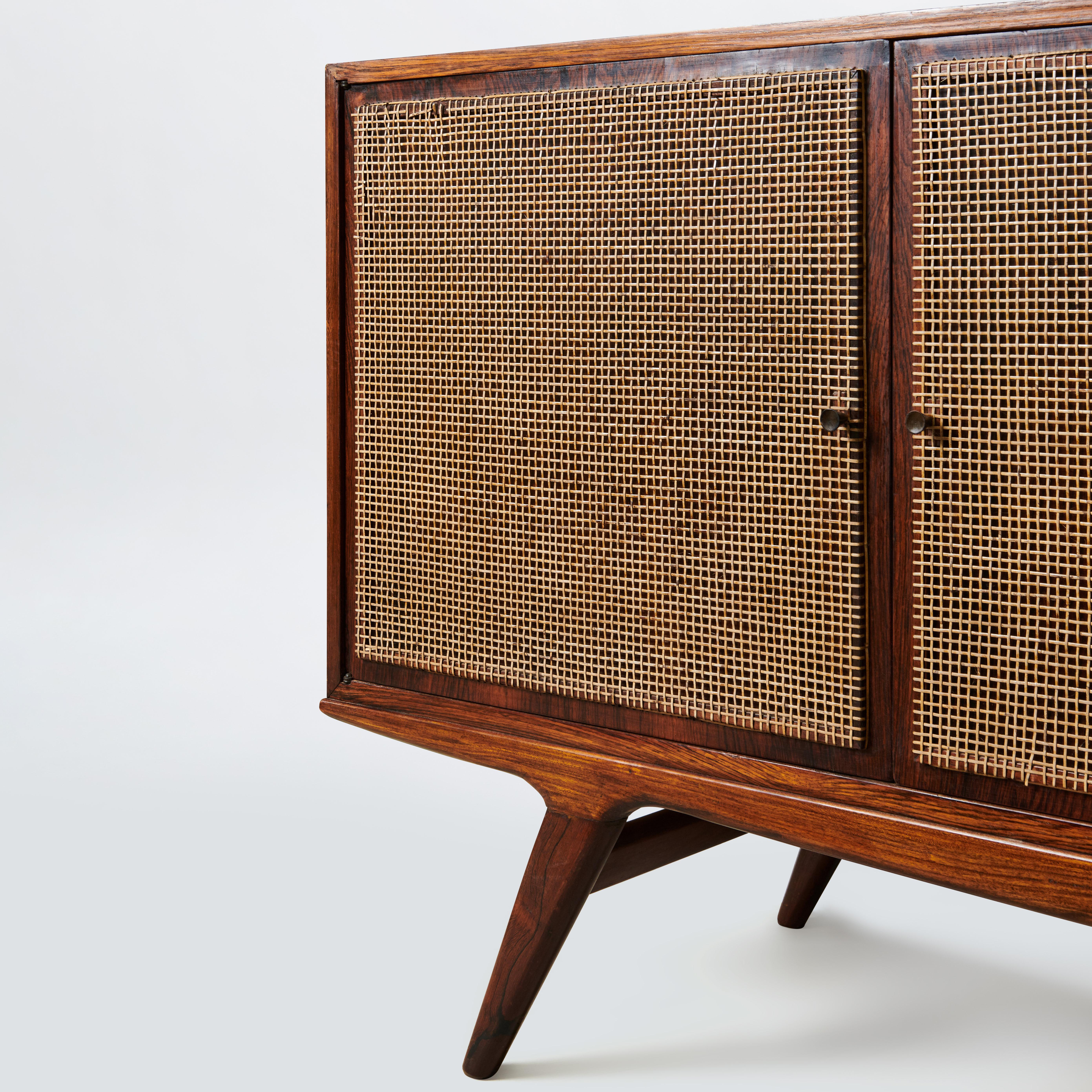 Carlo Hauner & Martin Eisler
Caviuna and Cane Sideboard with metal details
Manufactured by Forma
Brazil, 1950s.
  
