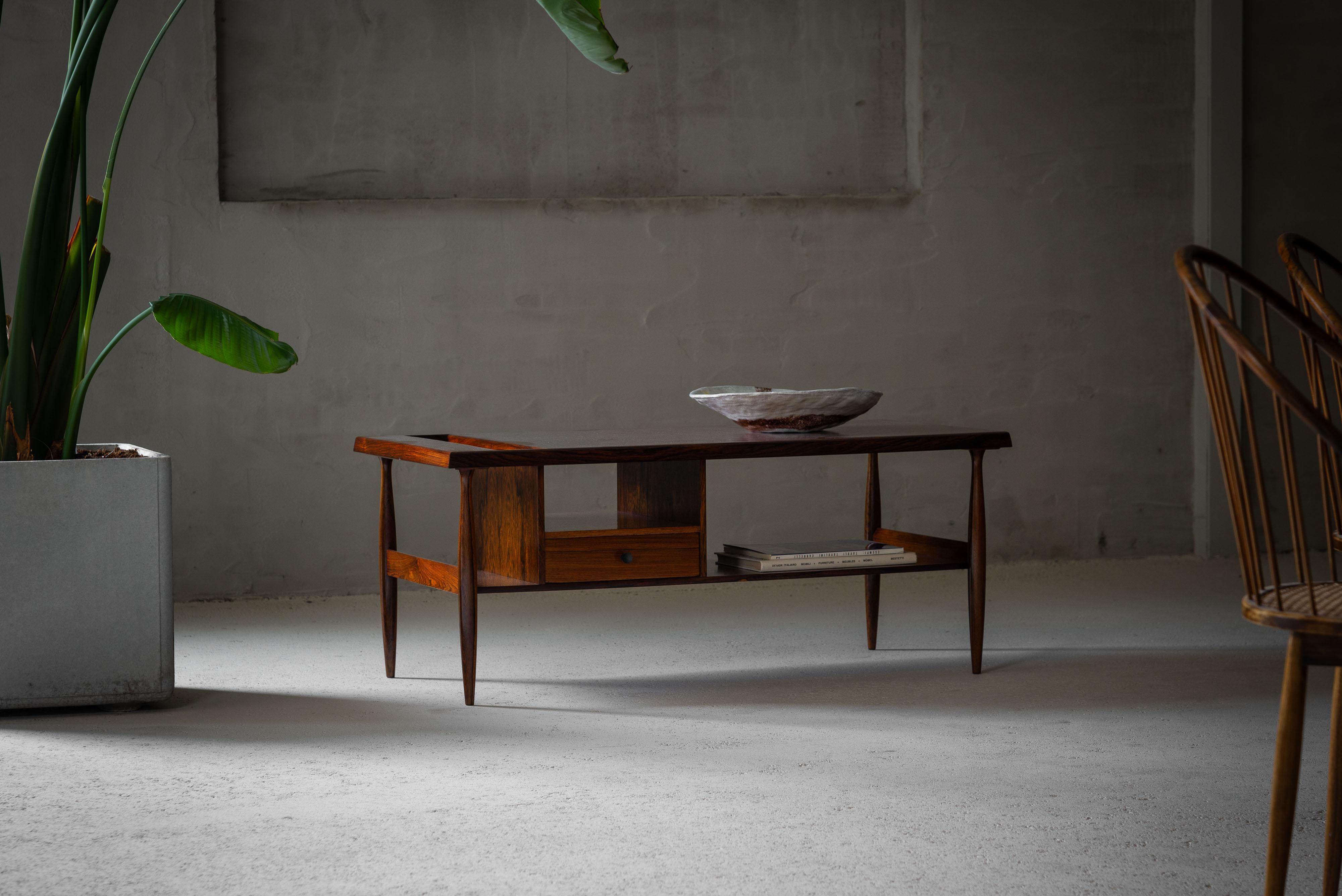 The Carlo Hauner Martin Eisler versatile table for Forma Italy in 1955, is a piece of furniture that embodies both functionality and style. With its adaptable design, this table seamlessly transitions between various roles, serving as a coffee