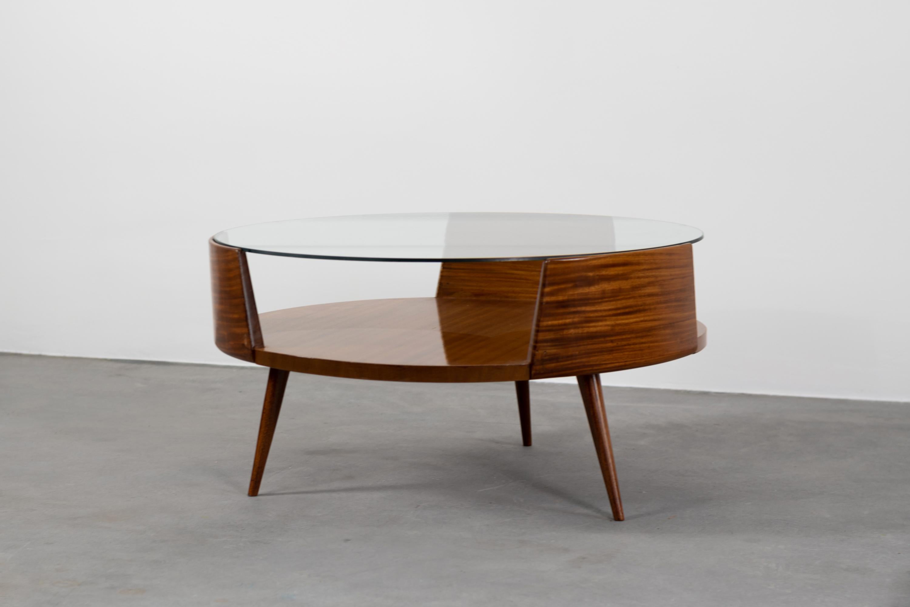 Coffee table for the living room in mahogany wood, ground crystal. Designed by Carlo Hauner and Martin Eisler in 1955.

Bibliography (similar model): Movel Brasileiro Moderno, Olhares 2017, pp. 230 - 231