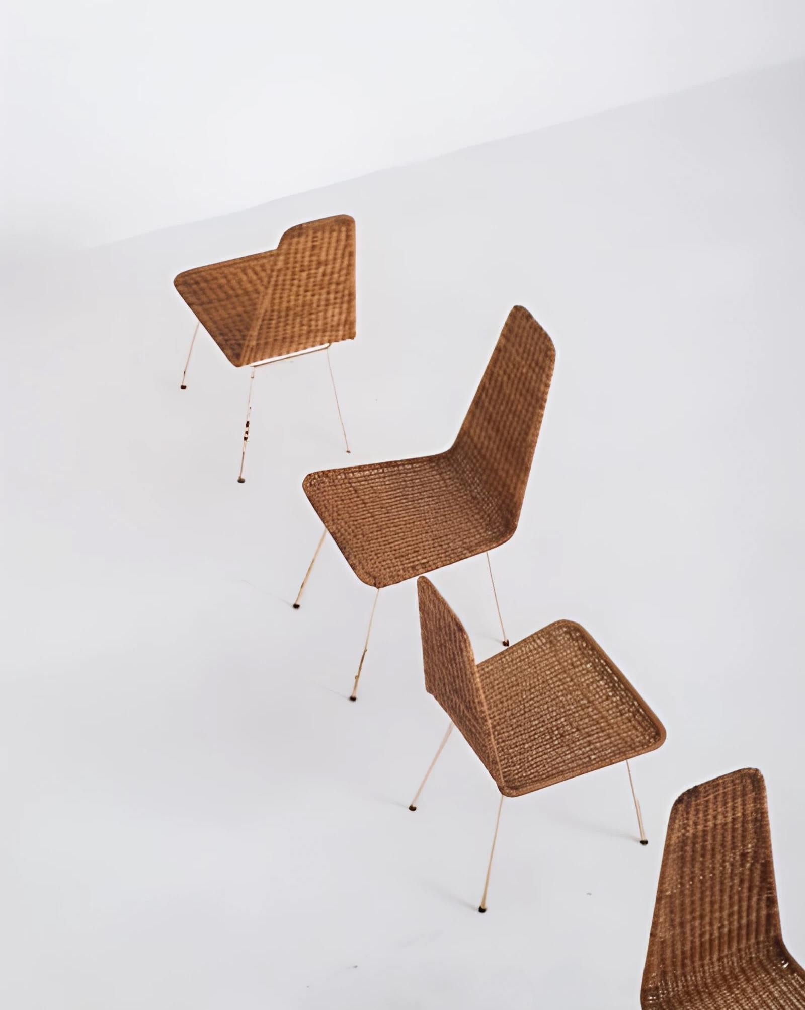 Brésilien Carlo Hauner. Suite de 4 chaises en rotin, vers 1950. Métal et rotin en vente