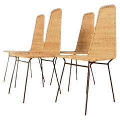 Carlo Hauner. Suite of 4 Rattan chairs, c. 1950. Metal and rattan