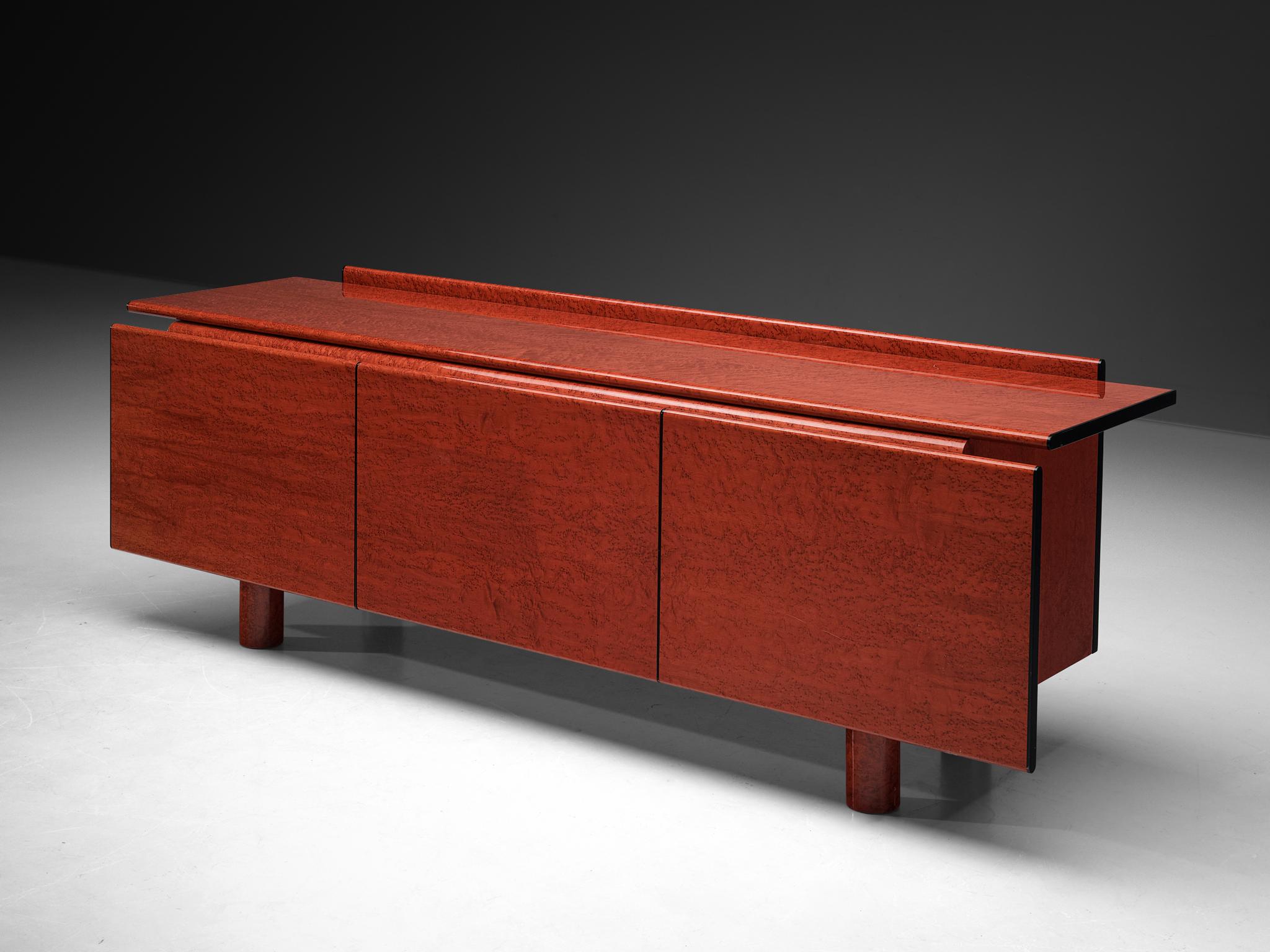 Carlo Marelli and Massimo Molteni for Borghi Giuseppe & Figli, sideboard, model 'Tula', red stained birdseye maple, glass, leather, Italy, 1980s

Designers Carlo Marelli and Massimo Molteni both graduated in Architecture from the Politecnico