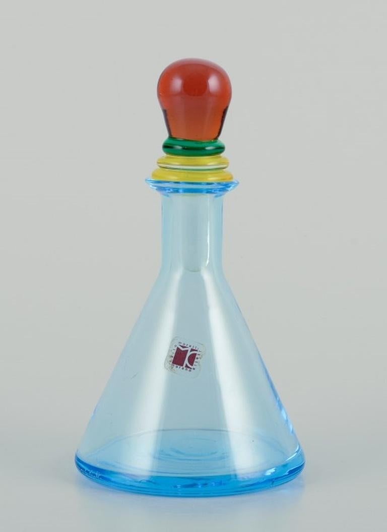 Carlo Moretti for Murano, Italy.
Decanter/bottle in art glass.
Mouth-blown glass in multiple colors.
Ca. 1980.
Signed and labeled.
Perfect condition.
Dimensions: H 13.0 cm with stopper x D 7.2 cm.