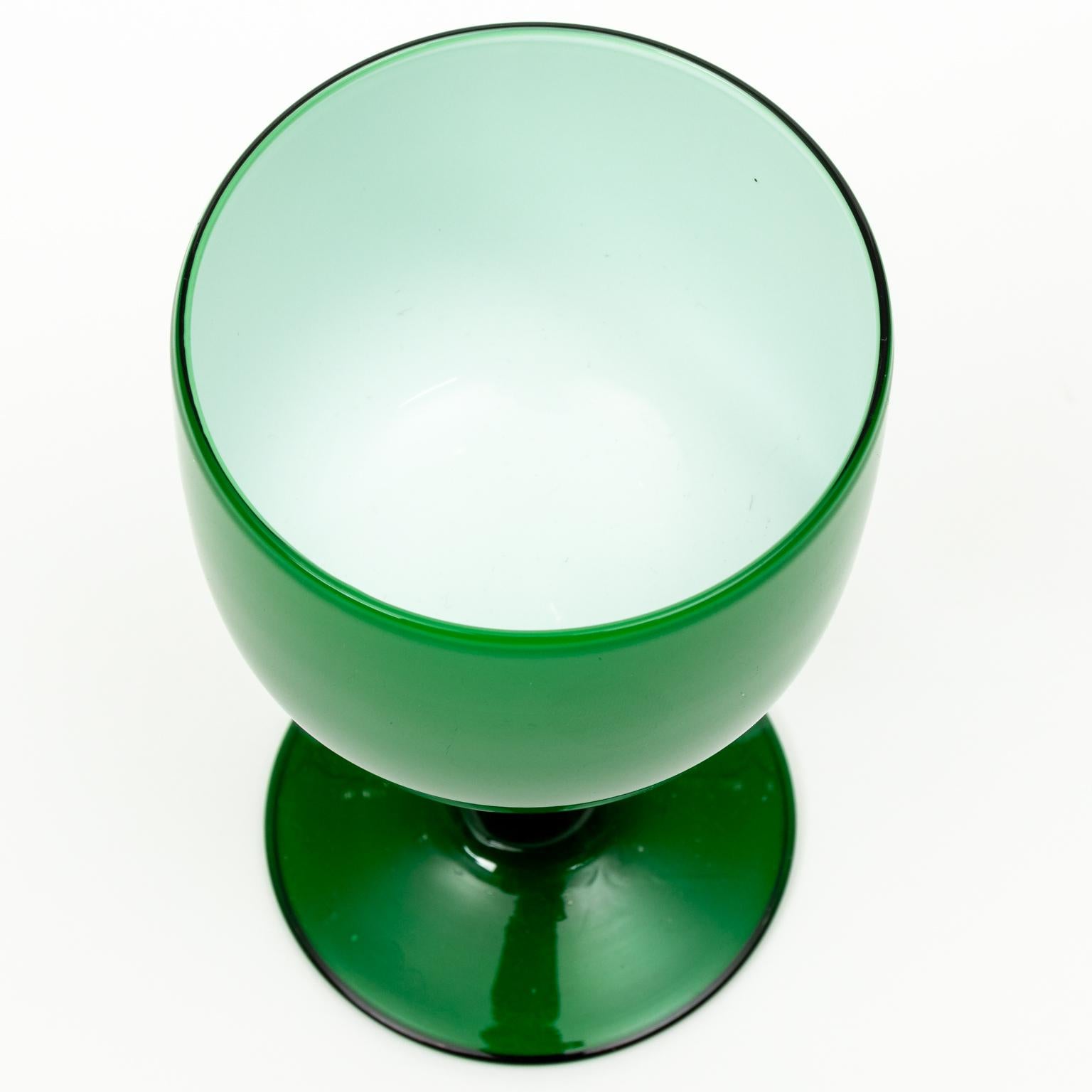 Circa 1960s set of four Carlo Moretti green glass goblets, suitable for wine or water. Made in Italy. Please note of wear consistent with age.