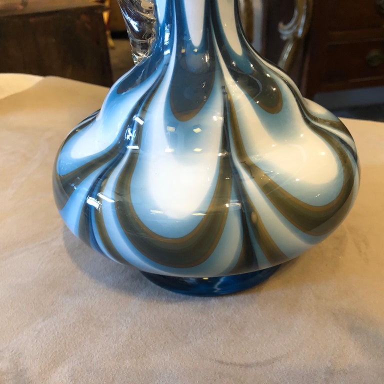 An opaline blue, brown and white Murano glass jug by Carlo Moretti. It's in perfect conditions.