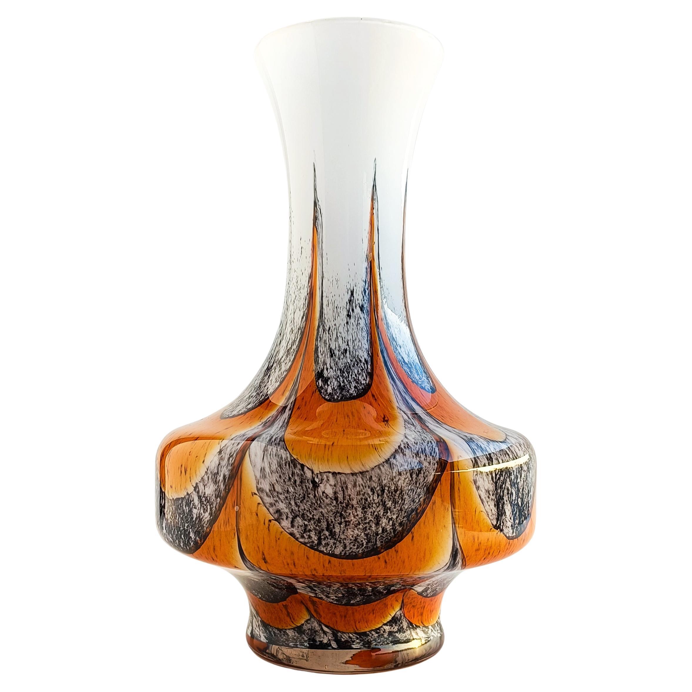 This Opalina Florentina art glass vase by Venetian glass artist Carlo Moretti indeed represents an iconic blend of classical marbled decor and futuristic Space Age design. The Opalina Florentina series gained popularity during the 1960s and 1970s