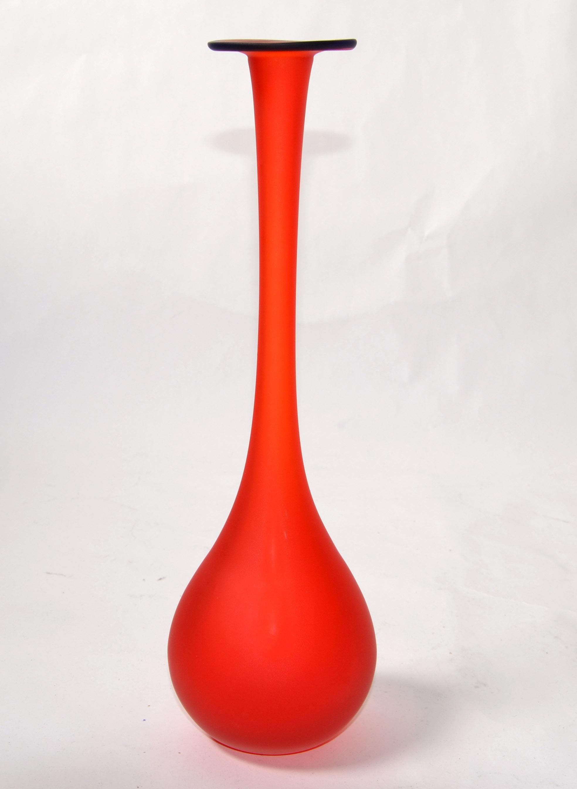 Carlo Moretti Style Mid-Century Modern satin glass bud vase, vessel in translucent red with a blue opening.
Very beautiful and clean design.
Opening measures: 0.75 Inches.