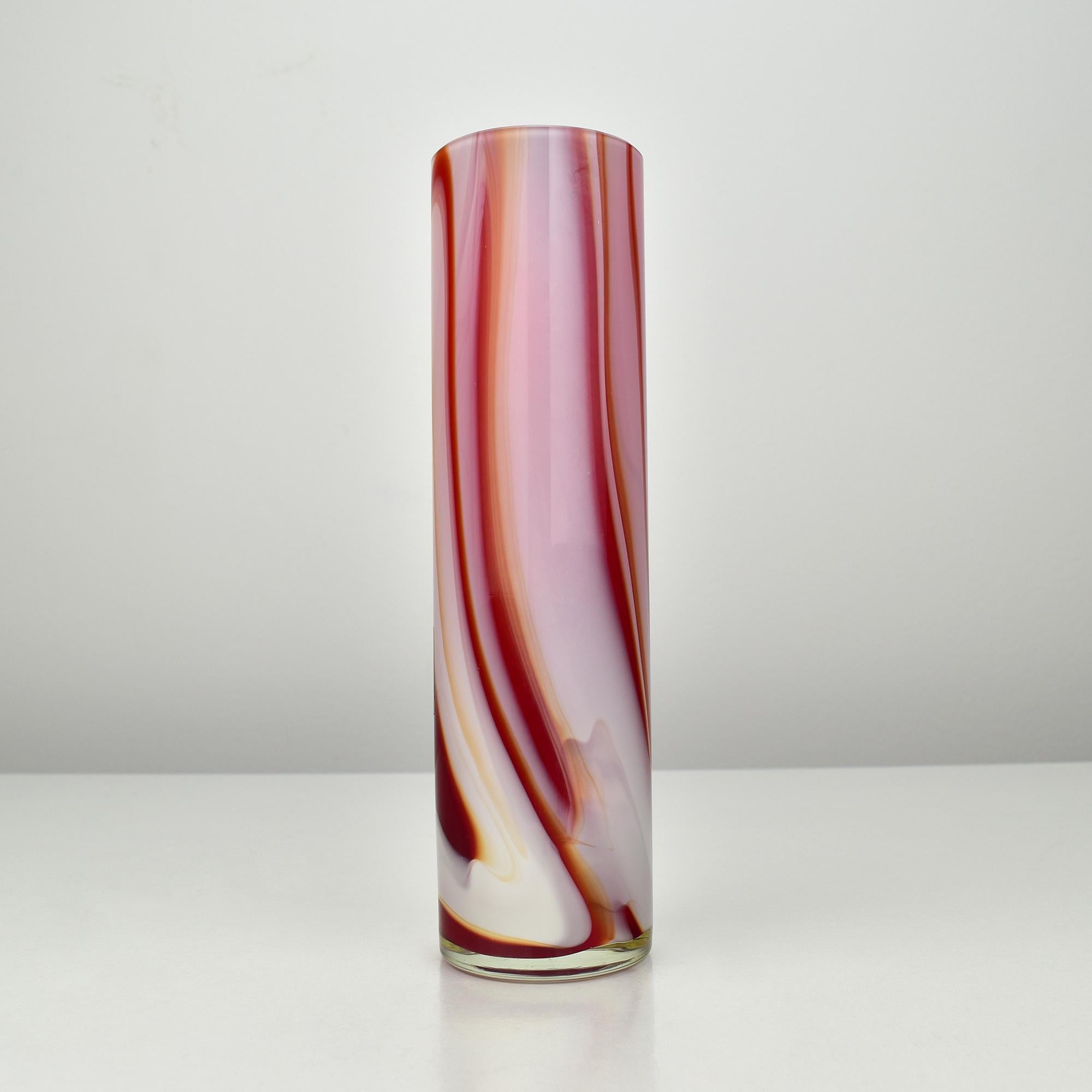 Red, pink, orange and white marbled art glass vase by Carlo Moretti from the 1970s. This is a stunning piece of Venetian studio art glass that reflects the unique style and creativity of the artist. The marbled pattern creates a mesmerizing effect