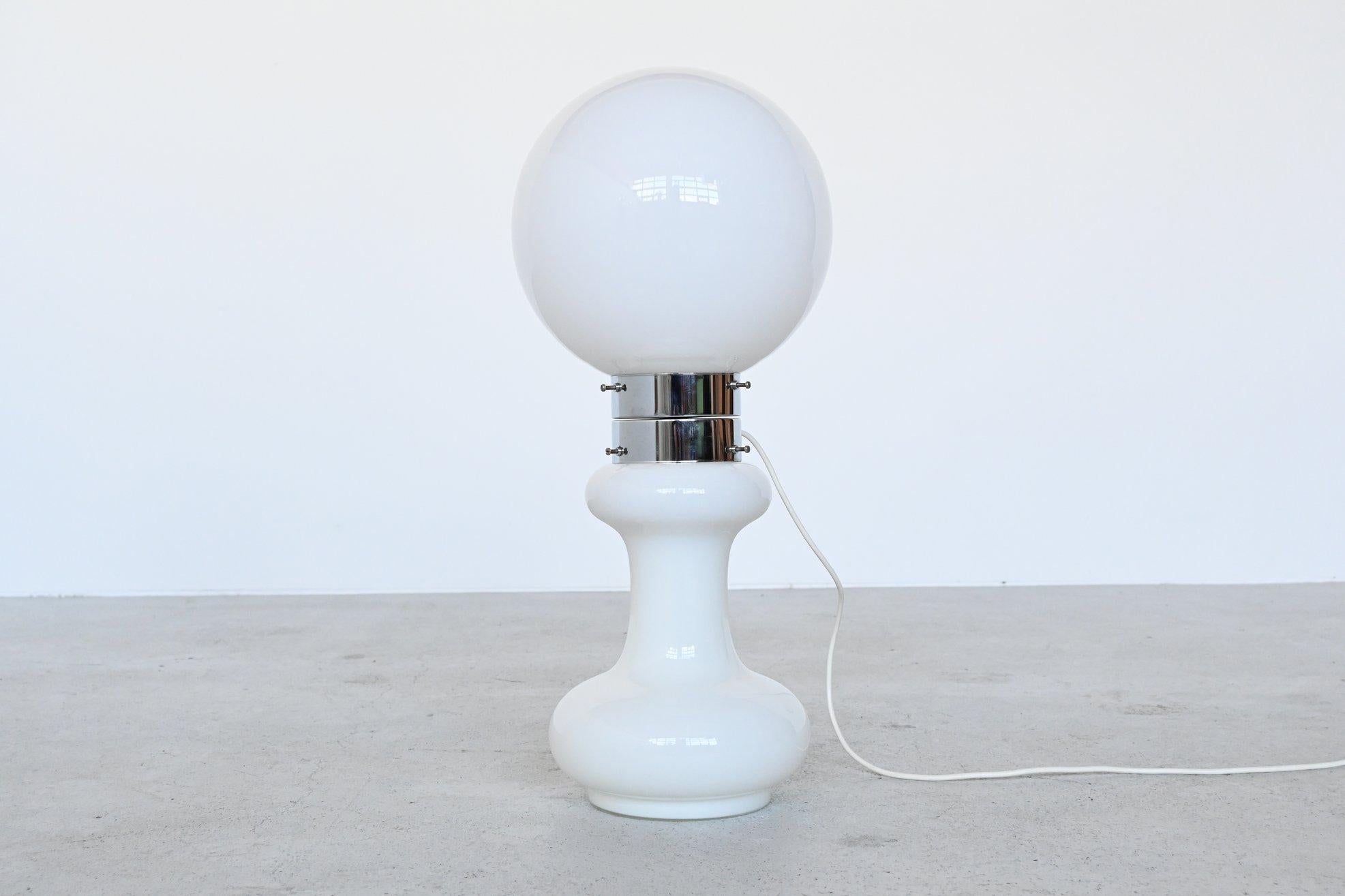 Beautiful Birillo floor or table lamp designed by Carlo Nason and manufactured by A.V. Mazzega Italy, 1960. The lamp consists of two bulb-shaped Murano blown glasses and joined in the middle by a chromed cylinder, which fixed them with a twist