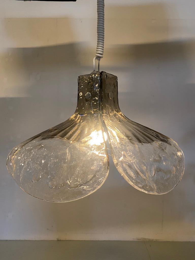 Beautiful Kalmar Franken (Austria) Hanging lamp. It’s made of beautiful Murano glass, smoked glass on top of the leaves and transparant at the end. The patterns in the glass are intriguing. The leaves are very heavy and of amazing quality. This