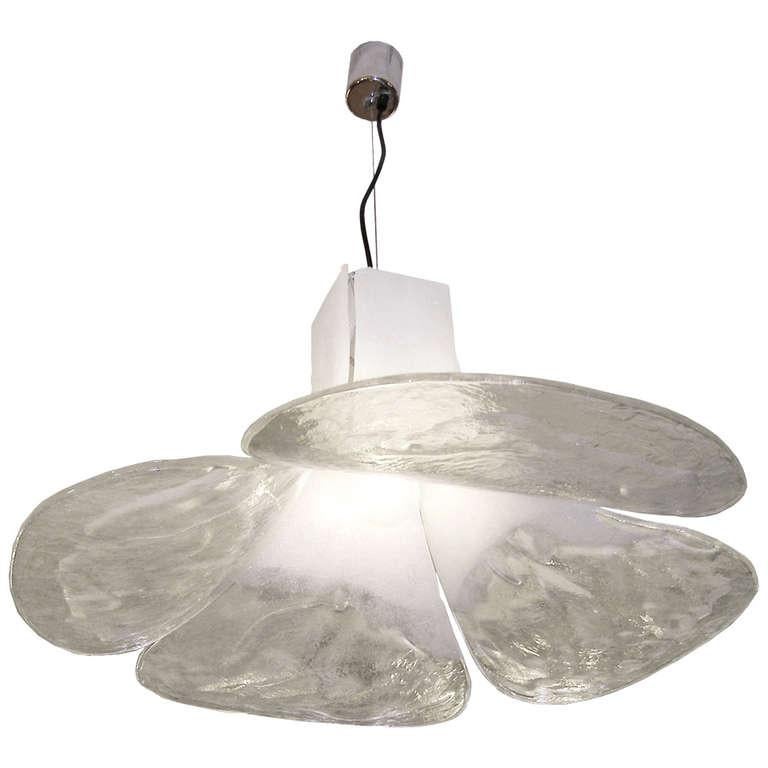 A chandelier consisting of four flared plates of glass in white fading into clear hanging from a metal frame by Carlo Nason for Mazzega.

Italian, Circa 1970's