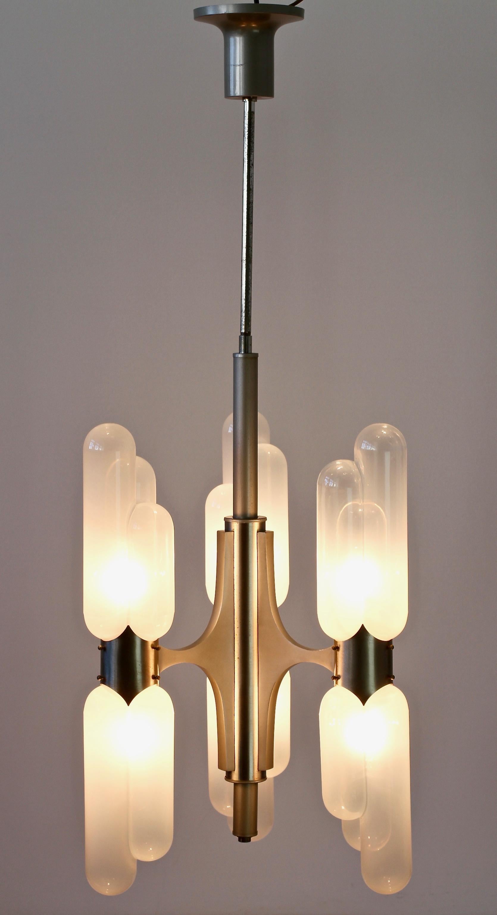 Futuristic vintage midcentury Murano glass  'Torpedo' chandelier or pendant light fixture designed by Carlo Nason and manufactured by Mazzega in the late 1960s-early 1970s. Beautiful design lamp featuring six handmade / mouth blown opaline glass