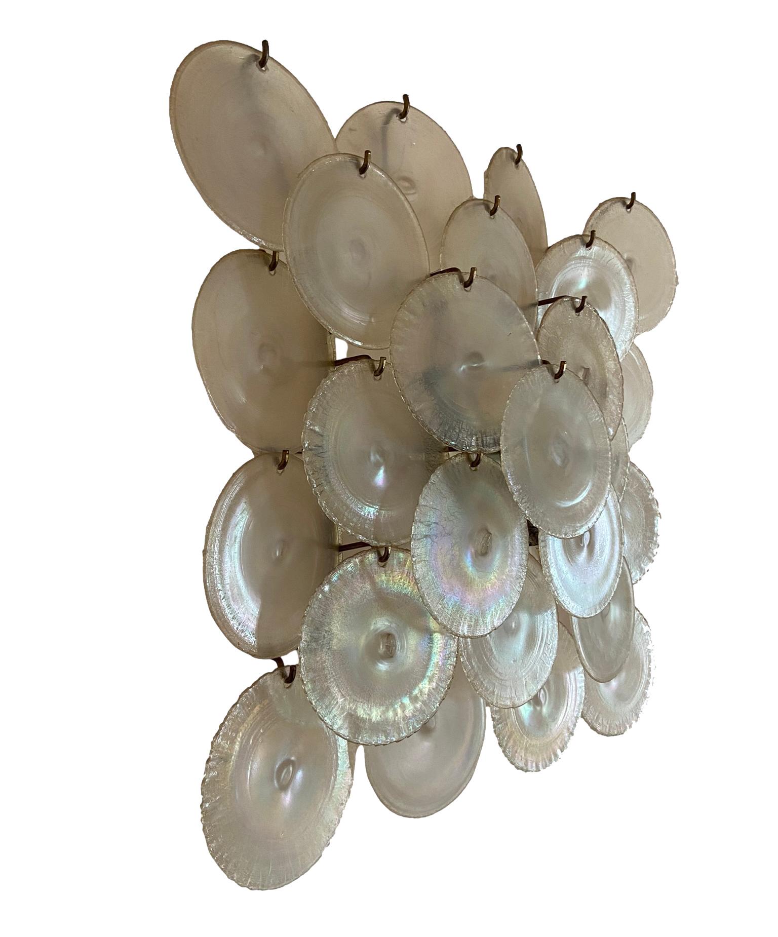Large disc-shaped applique in irridescent Murano glass designed by Carlo Nason for Mazzega Murano, Italy 1960. The applique rests on a nickel-plated metal structure with four light sources.  Very good condition.  The glass, now impossible to find,
