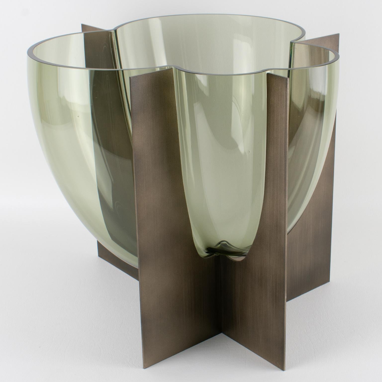 This stunning vase, in steel and Murano glass, was designed by Carlo Nason for Mazzega in 1969. This rare piece has a significant sculptural flair. A masterpiece that blends the mastery of Murano glass with the elegance of stainless steel. The