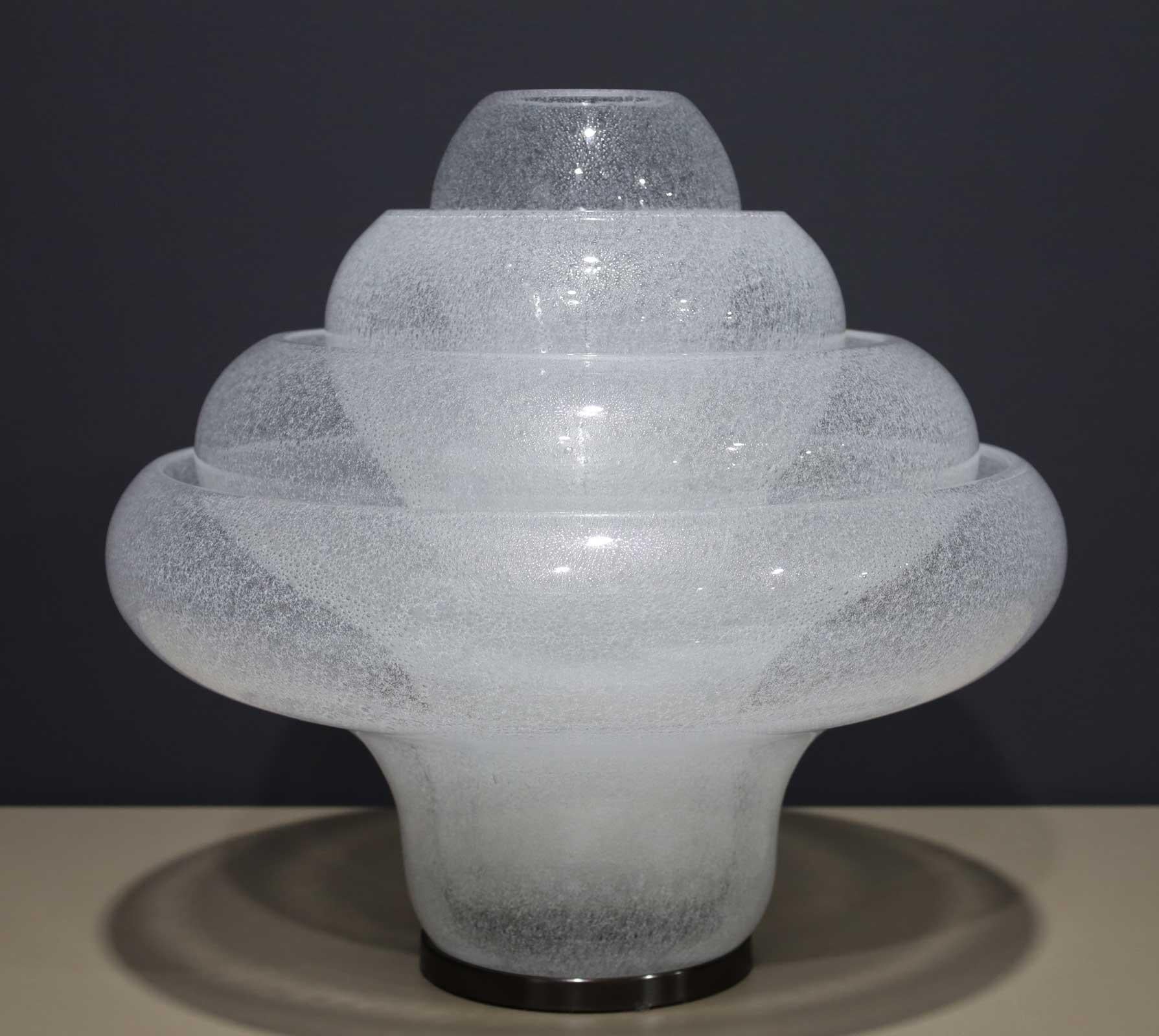 The beautiful lotus lamp by Carlo Nason. Made in Italy with gorgeous murano glass. Lamp has 4 layers, with 3 removable layers that are inserted in the center. A gas type bulb illuminates the lamp.