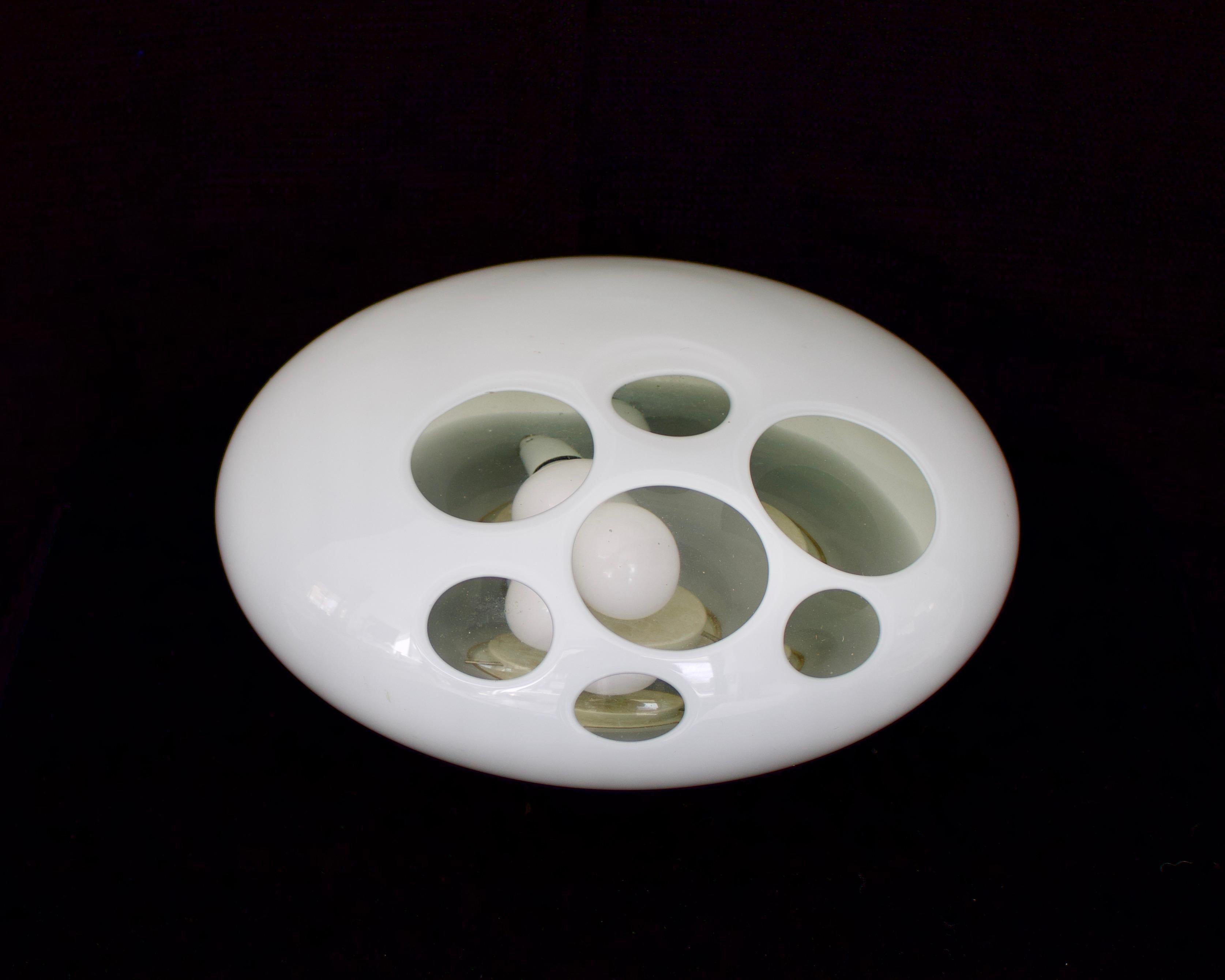 Carlo Nason Moon Base Lamp Model LT 357 in opaque and clear glass. The polished circular round windows allow the diffused light to emit like the moon. The opaque glass glows like the moon at night. 
Nason came from a glassmaker family in Murano.