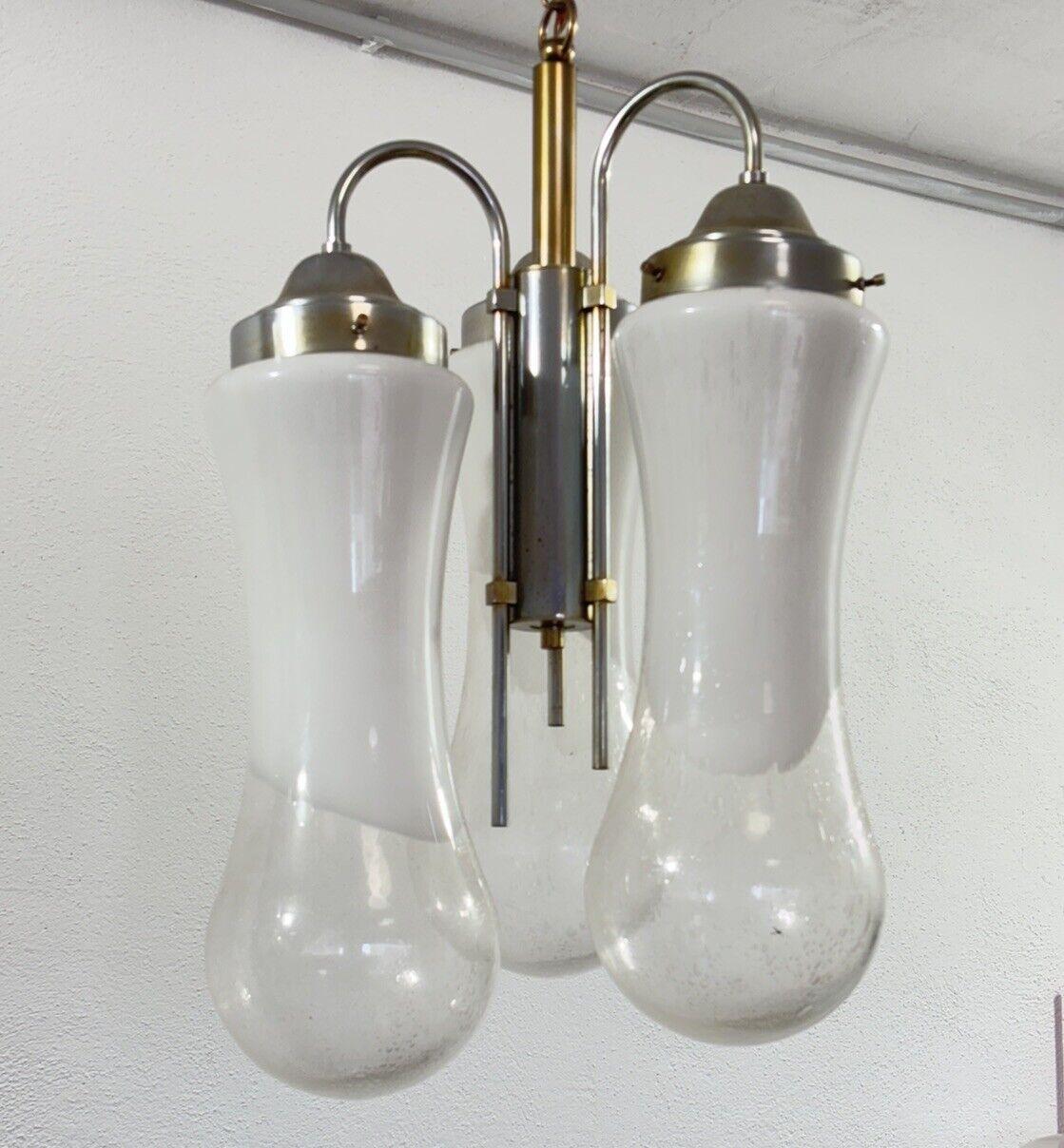 Carlo Nason Mazzega Lampadario Murano Design 1970’s Modernariato.

Struttura in acciaio e ottone , diffusori in vetro di Murano .

L’articolo è in buone condizioni conservative, non vi è alcun difetto estetico o strutturale importante da segnalare,