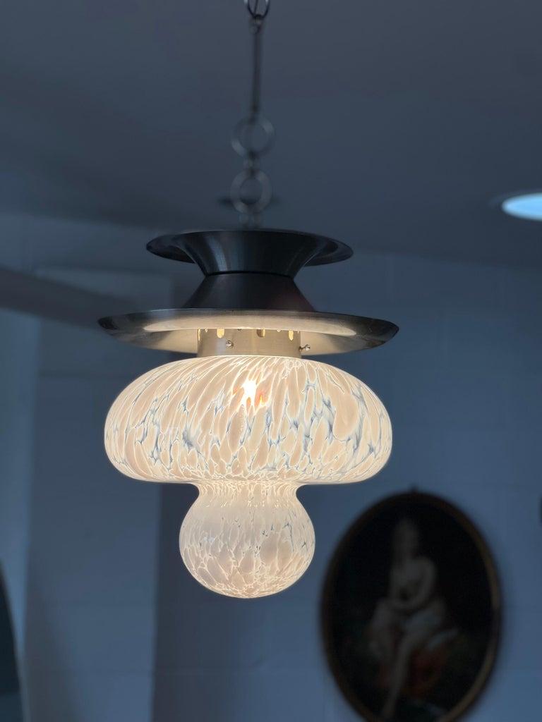Rare Carlo Nason for Mazzega Murano
pendant lamp.
Carlo Nason (1935 Murano), is a famous Italian glass artist, his use of historical techniques in producing inventive lamps, vases, and sculptures. Born in 1935 in Murano, Italy. his works are in the