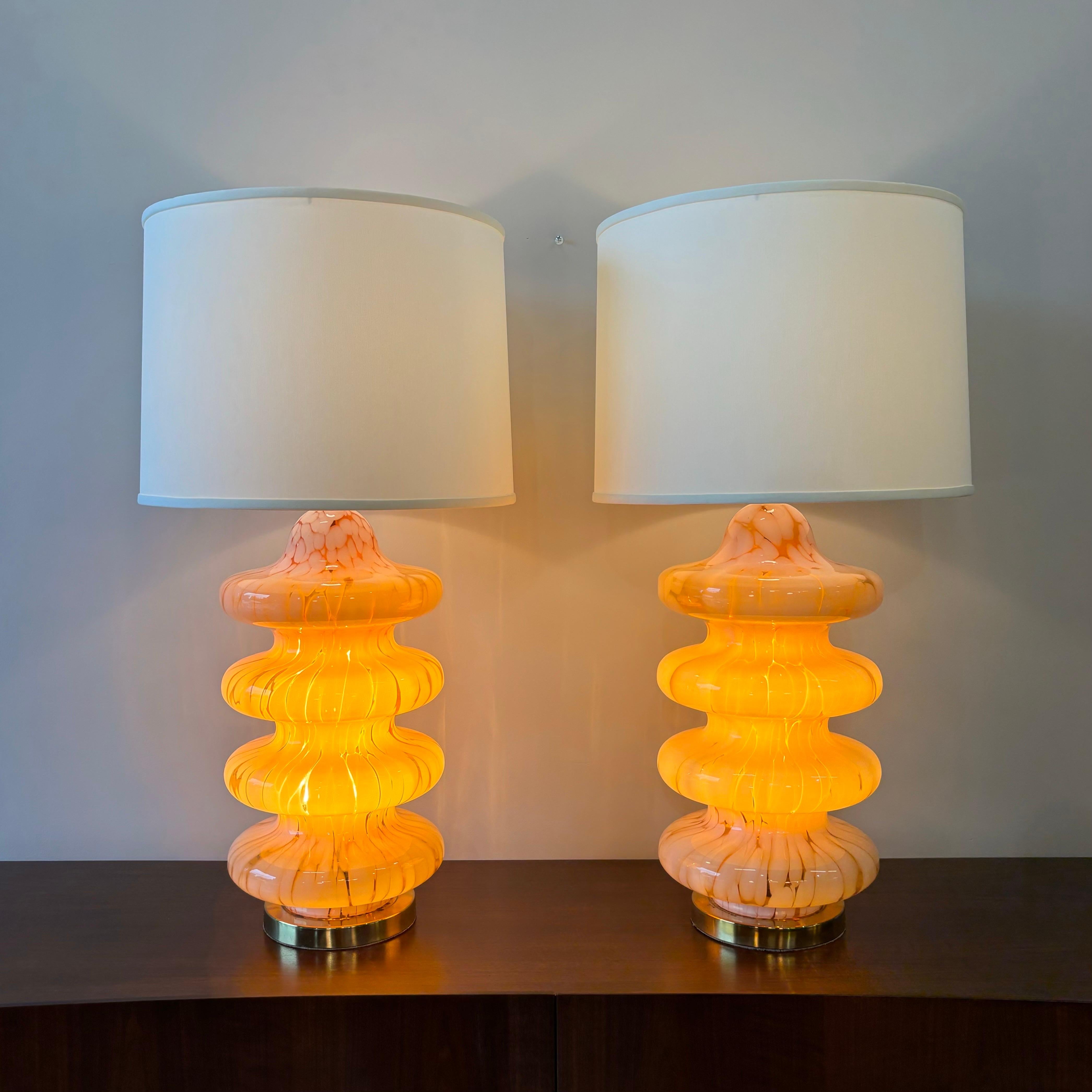 Carlo Nason four tier Pagoda table lamps.  Vintage modern pair from Murano Italy, 1970s, with lighted base and new shades.  Beautiful peach colored glass with white feathered in.  Very good original condition with glass plated bases showing some