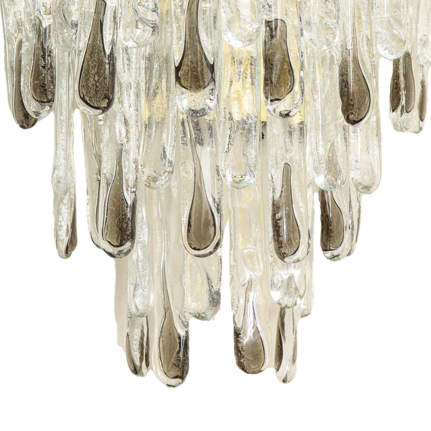 Unique hand-crafted clear and smoke glass sconces with brass body. Design by Carlo Nason for Mazzega Murano. Italy 1970’s

 