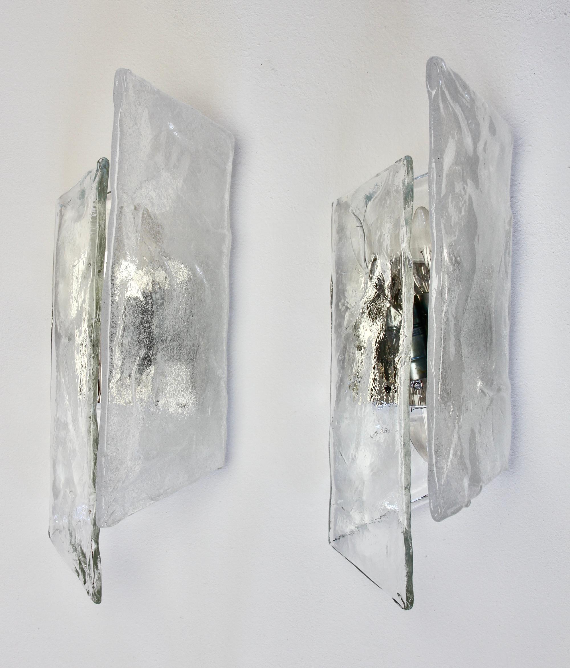 Rare vintage midcentury modern pair (2 pairs available) of polished steel, white and clear Murano glass wall lamps, lights or sconces by Murano glass Italian designer Carlo Nason for the famous Austrian lighting manufacturer Kalmar, circa late