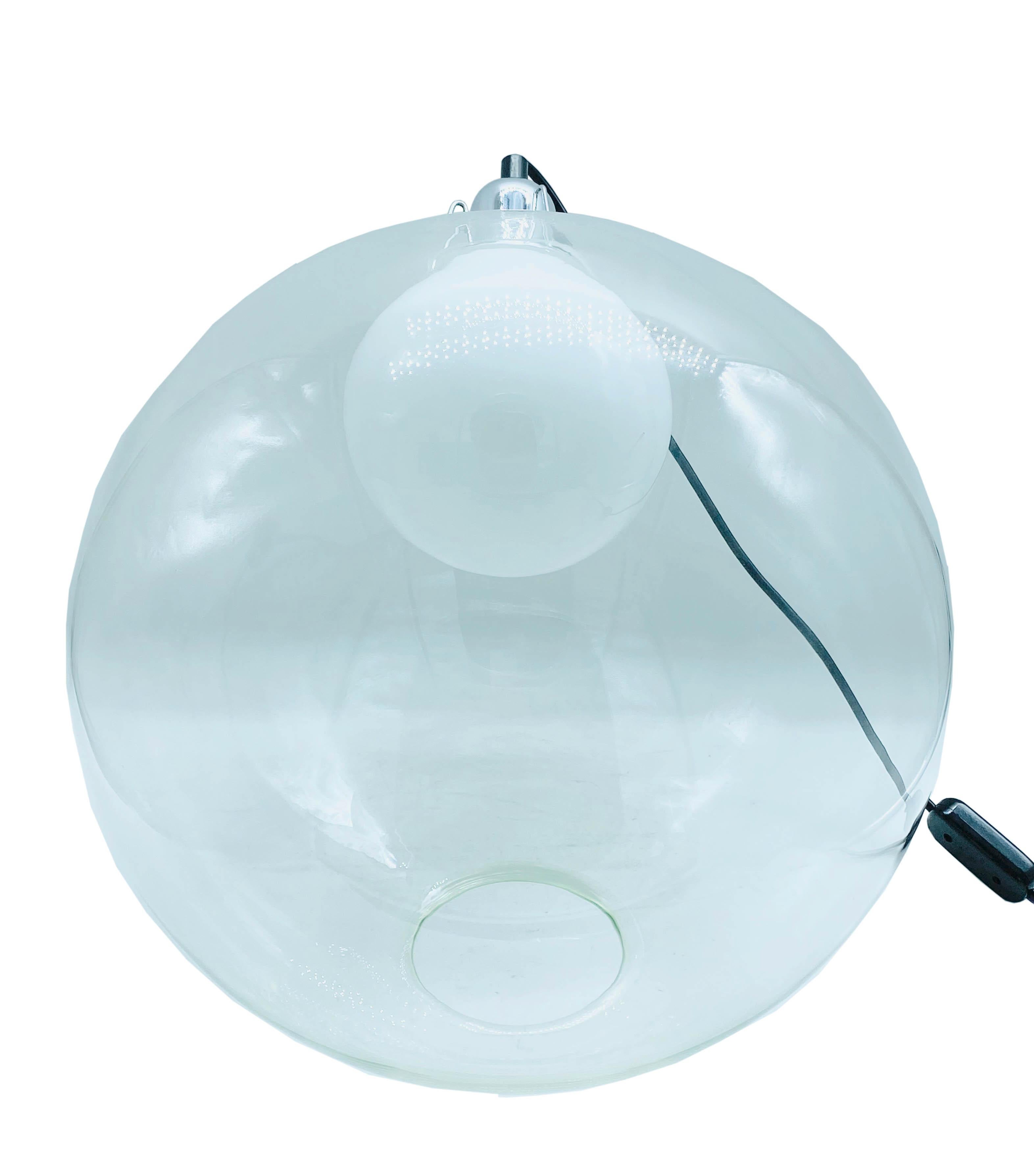 Beautiful table lamp consisting of a large blown glass globe.