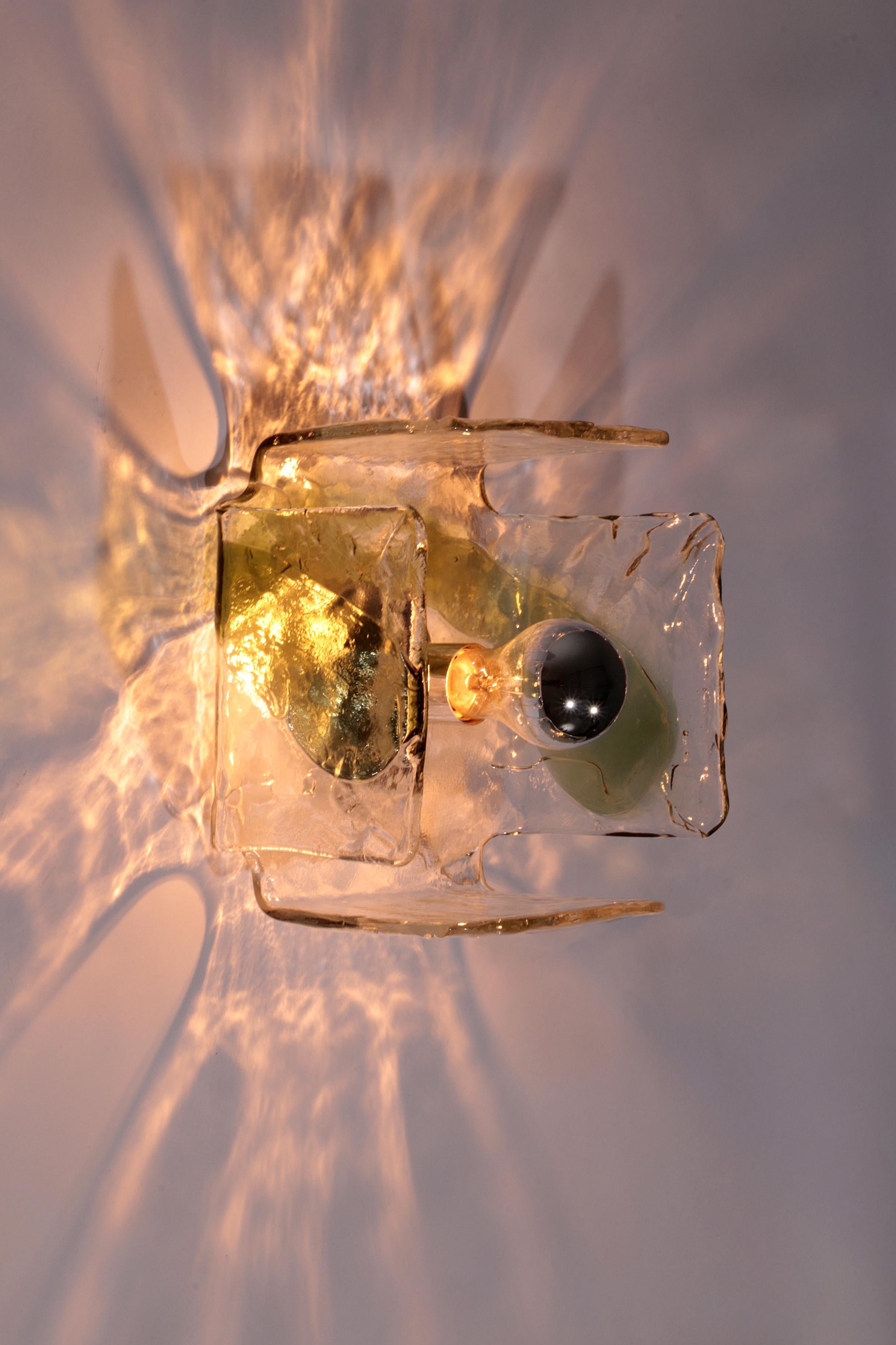

Wonderful midcentury wall sconces with handcrafted Murano glass pieces on a chrome base, made by J.T. Kalmar, Austria, manufactured, circa 1960-1969. Designed by Carlo Nason. High quality and in very good condition. Cleaned, well-wired and ready