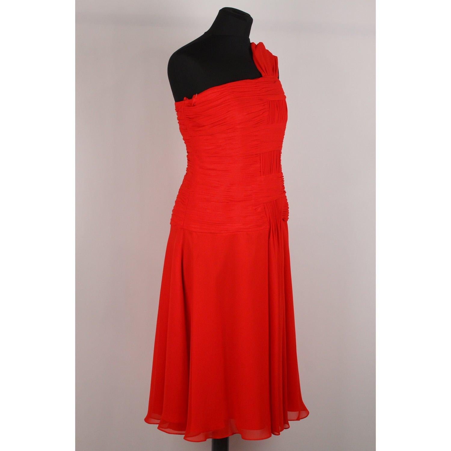 MATERIAL: Silky fabric

COLOR: Red

MODEL: Midi Dress

GENDER: Women

SIZE: Small

COUNTRY OF MANUFACTURE: Italy

Condition
CONDITION DETAILS:

A+ :MINT CONDITION! Mint item. Never worn or used - Carlo Pignatelli shop hang tag still