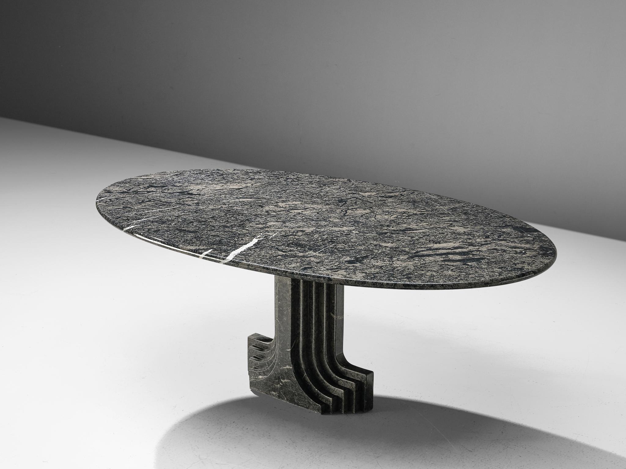 Carlo Scarpa for Simon, oval table, marble, Italy, 1970s.

Carlo Scarpa was trained as an architect and influenced by various themes. His main focus was the material itself followed by nature, Venetian and Japanese culture. This 'argo marble table