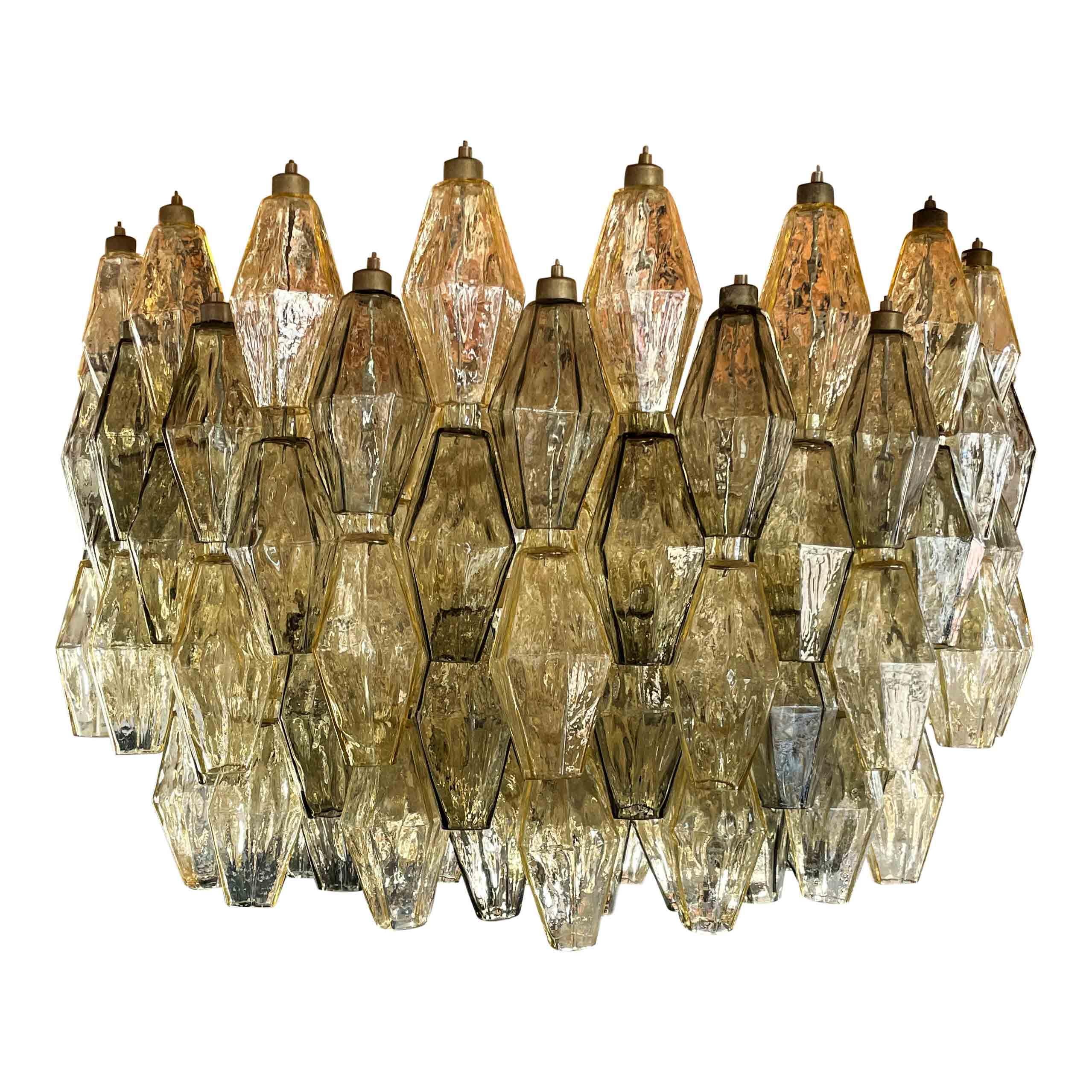 “Poliedri” chandelier designed by Carlo Scarpa and produced by the Italian manufacturer Venini in, 1958.

Made of opaline Murano glass.

Born in Venice on June 2nd, 1906, Carlo Scarpa began working at a very early age. Only a year after he had