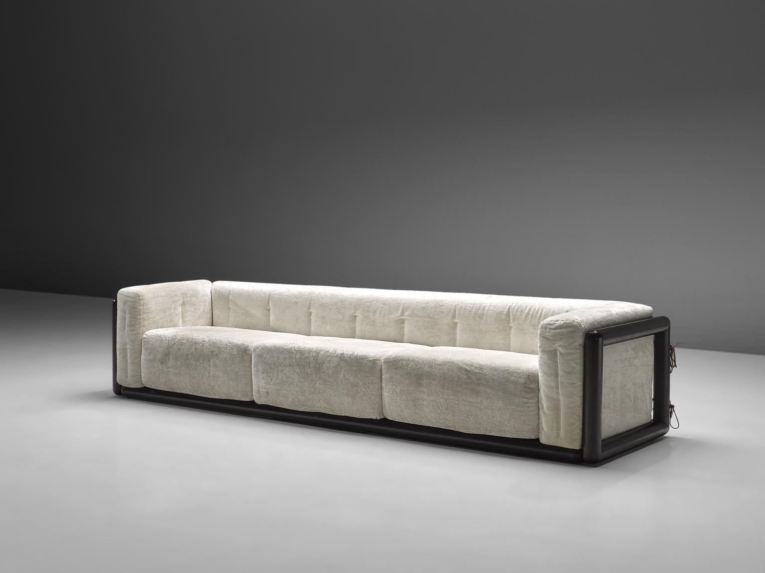 Carlo Scarpa for Simon, 'Cornaro' sofa, white velvet fabric, wood, Italy, 1973

The sofa has a very thick cushion and is upholstered with the original pink fabric. The sofa has a relatively thin back and armrests. The frame is made out of a thick
