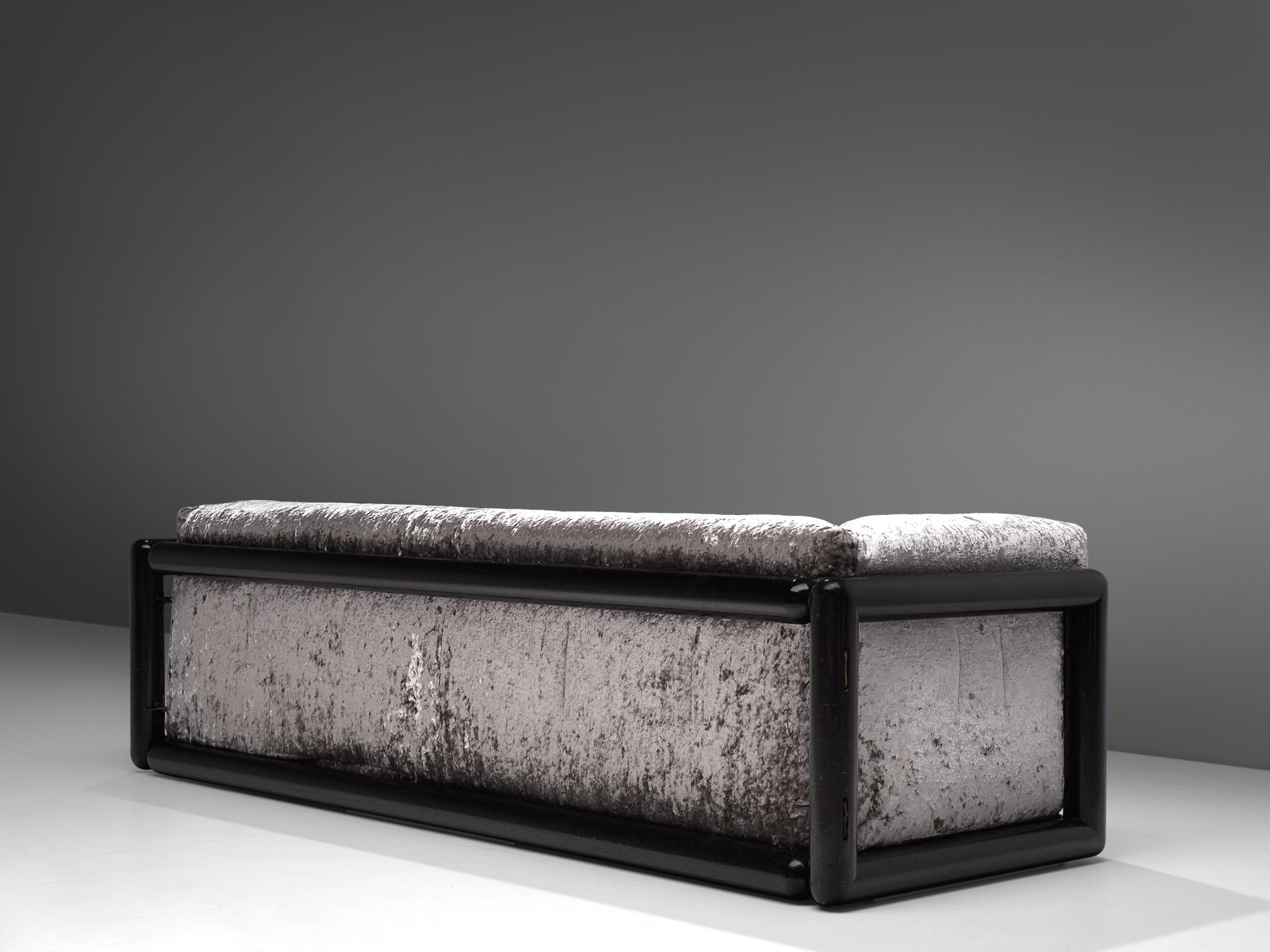 Carlo Scarpa for Simon, 'Cornaro' sofa, silver metallic velvet fabric, wood, Italy, 1973

The 'Cornaro' sofa by Carlo Scarpa is a perfect example of the ultrarazionale style; breaking away from the strict limits of rationalism, resulting in a sofa
