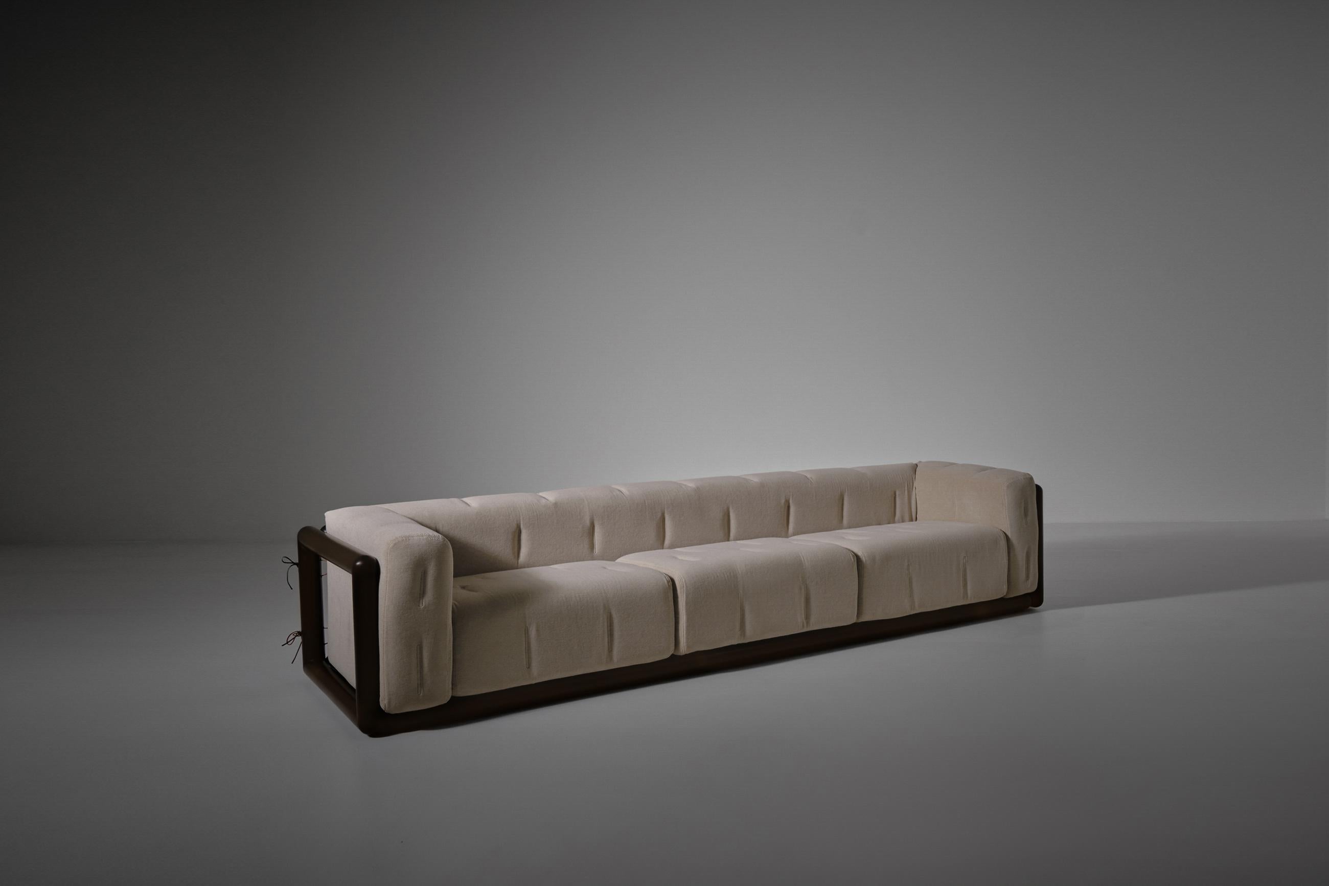 'Cornaro' sofa by Carlo Scarpa for Simon Gavina, Italy 1973. Stunning round Mahogany wooden frame and thick upholstered cushions. The cushions are reupholstered in a high quality compact voluminous velvet following the original model and stitching