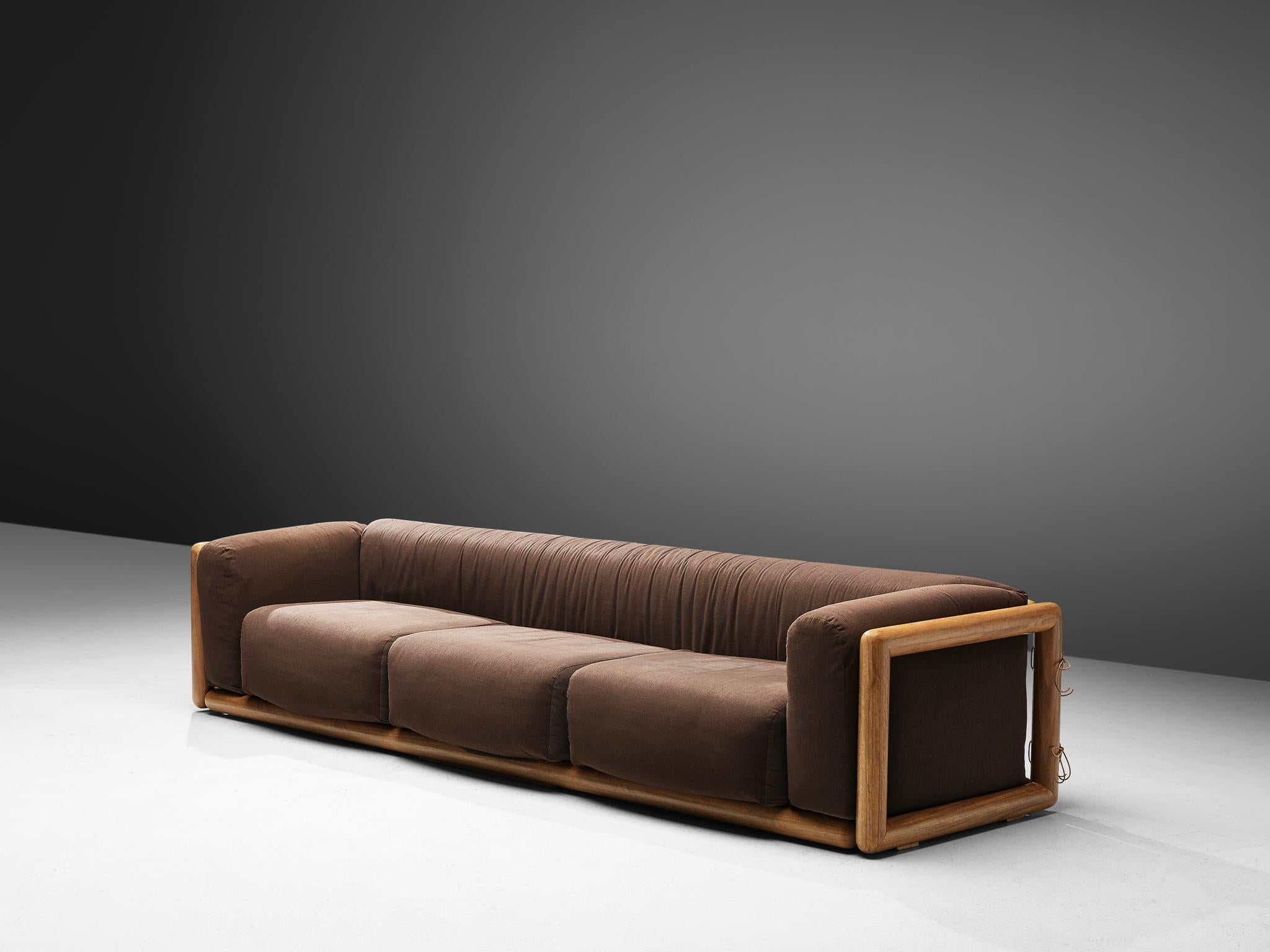 Carlo Scarpa for Simon, 'Cornaro' sofa, brown fabric, wood, Italy, 1973. 

The 'Cornaro' sofa by Carlo Scarpa is a perfect example of the Ultrarazionale style; breaking away from the strict limits of Rationalism, resulting in a sofa with a solid