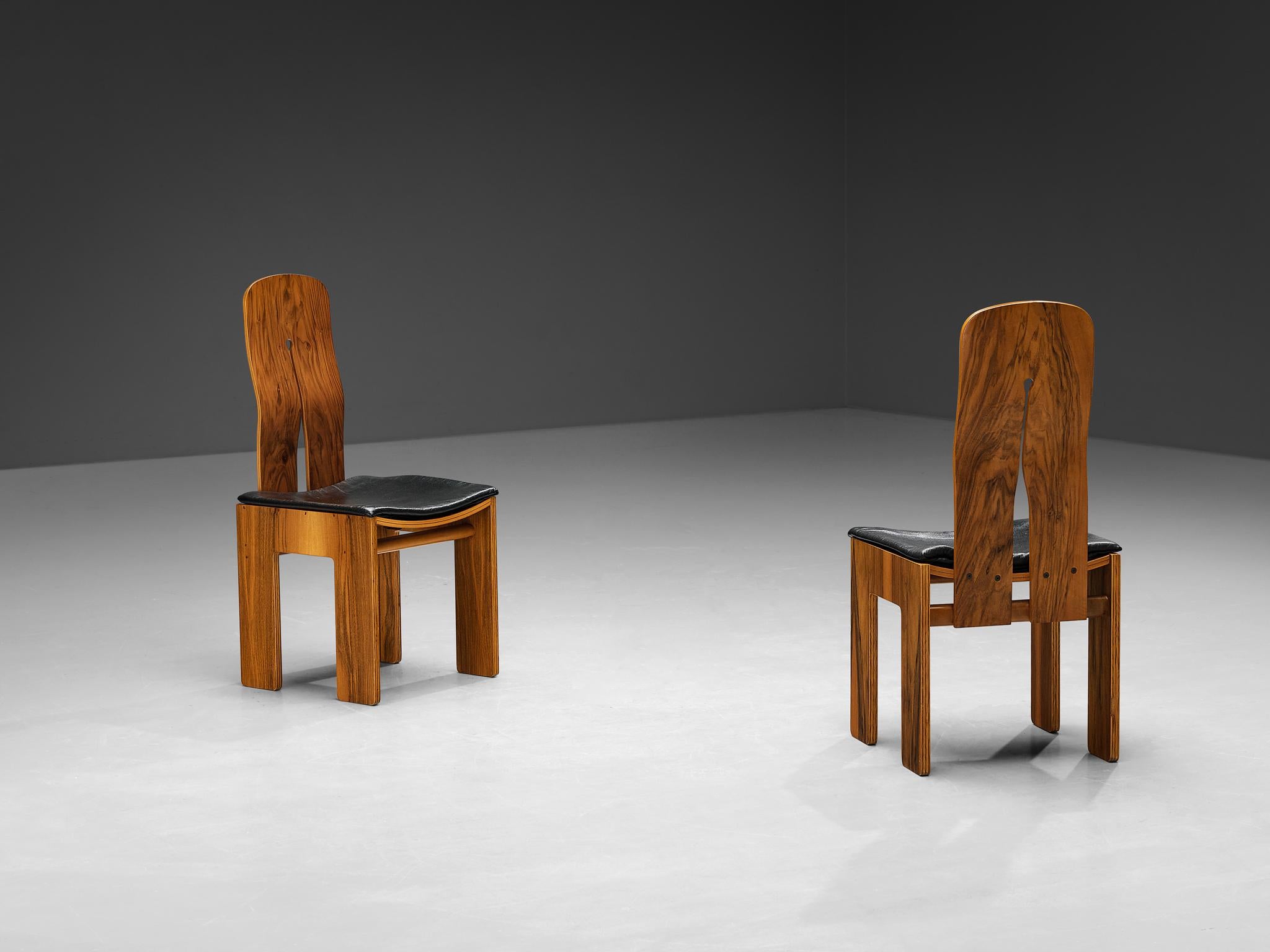 Carlo Scarpa for Bernini, pair of dining chairs model '765', walnut, black leather, design 1934, production 1970s

These well-proportioned chairs are designed by Carlo Scarpa in 1934, a design that was not produced until 1977. He exclusively created