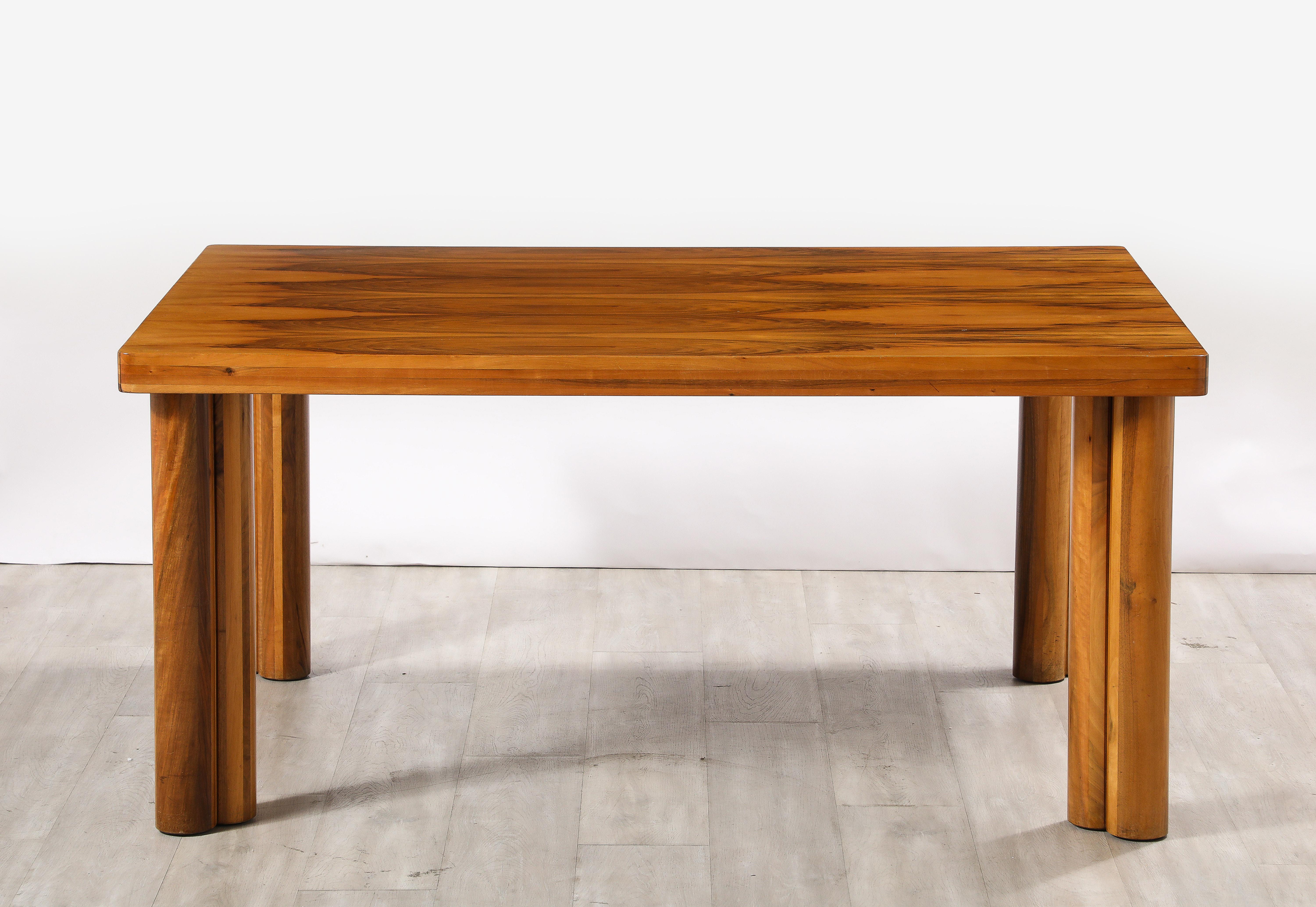 Carlo Scarpa, 'Scuderia' Walnut Dining Table, manufactured by Bernini in 1977 

Of solid walnut structure the grain of the wood is spectacular; with sculpted and canted corner legs and of very simple and gracious form.   This is likely one of the