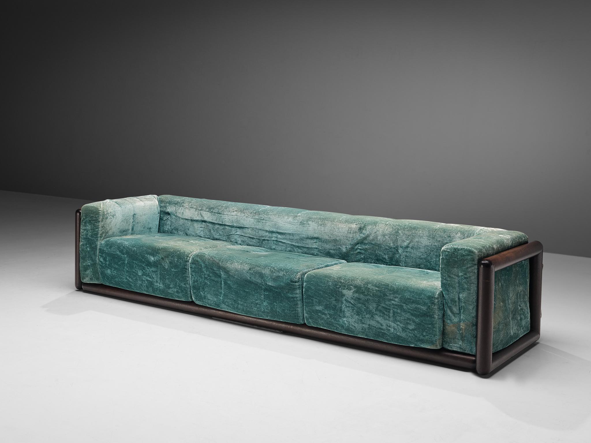 Carlo Scarpa for Simon Collezione, 'Cornaro' sofa, jade velvet fabric, stained mahogany, Italy, 1973

The 'Cornaro' sofa by Carlo Scarpa is a perfect example of the Ultrarazionale style; breaking away from the strict limits of Rationalism, resulting