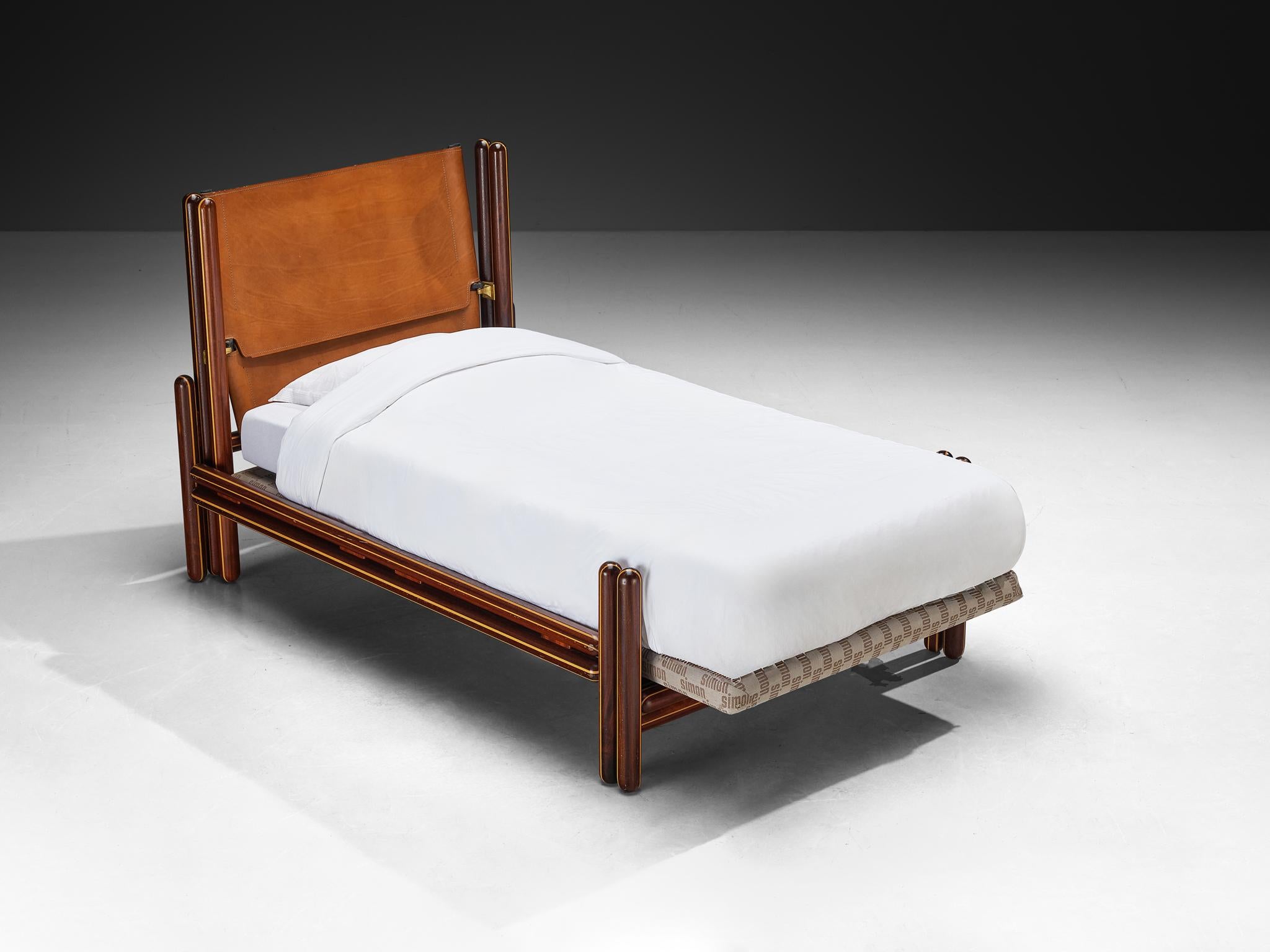 Carlo Scarpa for Simon Gavina, 'Toledo' single bed, padouk, maple, leather, metal, Italy, 1975

Created by the Italian master Carlo Scarpa, this bed clearly demonstrates his studies in architecture, with geometric shapes and constructive elements