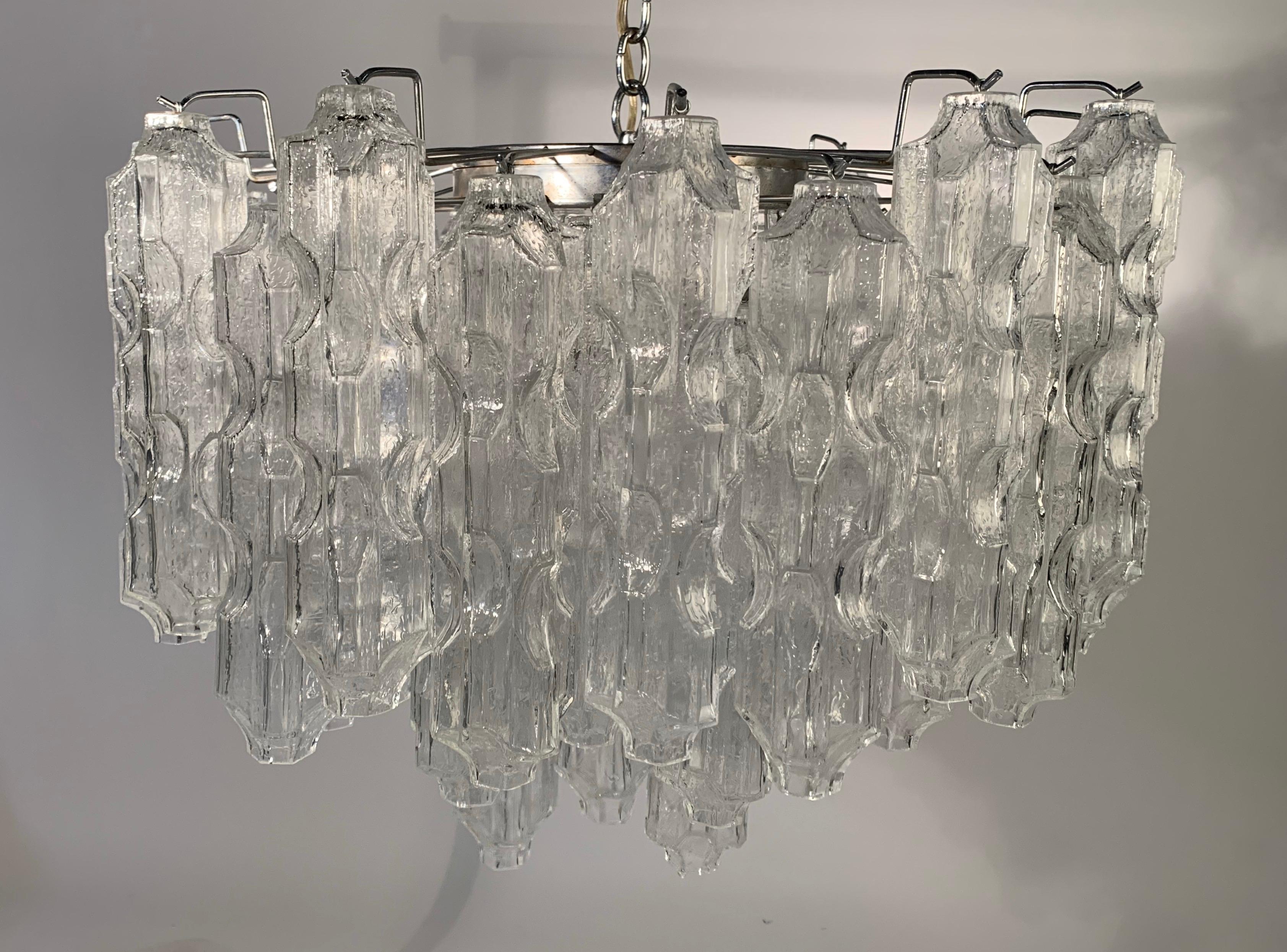 A rare chandelier designed by Carlo Scarpa for Venini Italy having 54 12” Murano glass globes. This chandelier is stunning to say the least. It will absolutely grab any eye that enters the room that it exists in.
Shipping will be courier hand