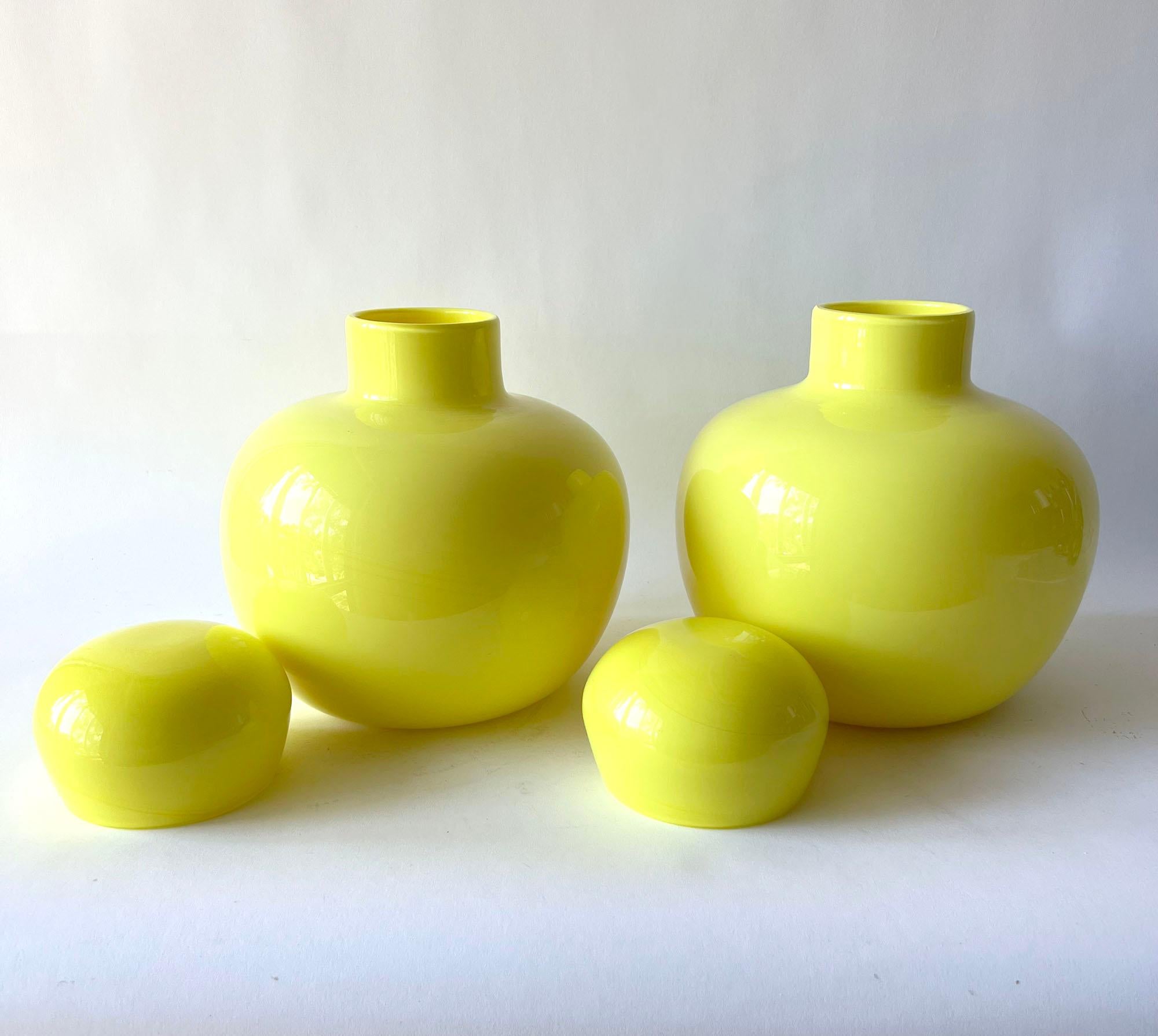 Pair of soft yellow cased glass ginger jars designed by Carlo Scarpa for Venini, circa 1980's. Jars measure 10.5