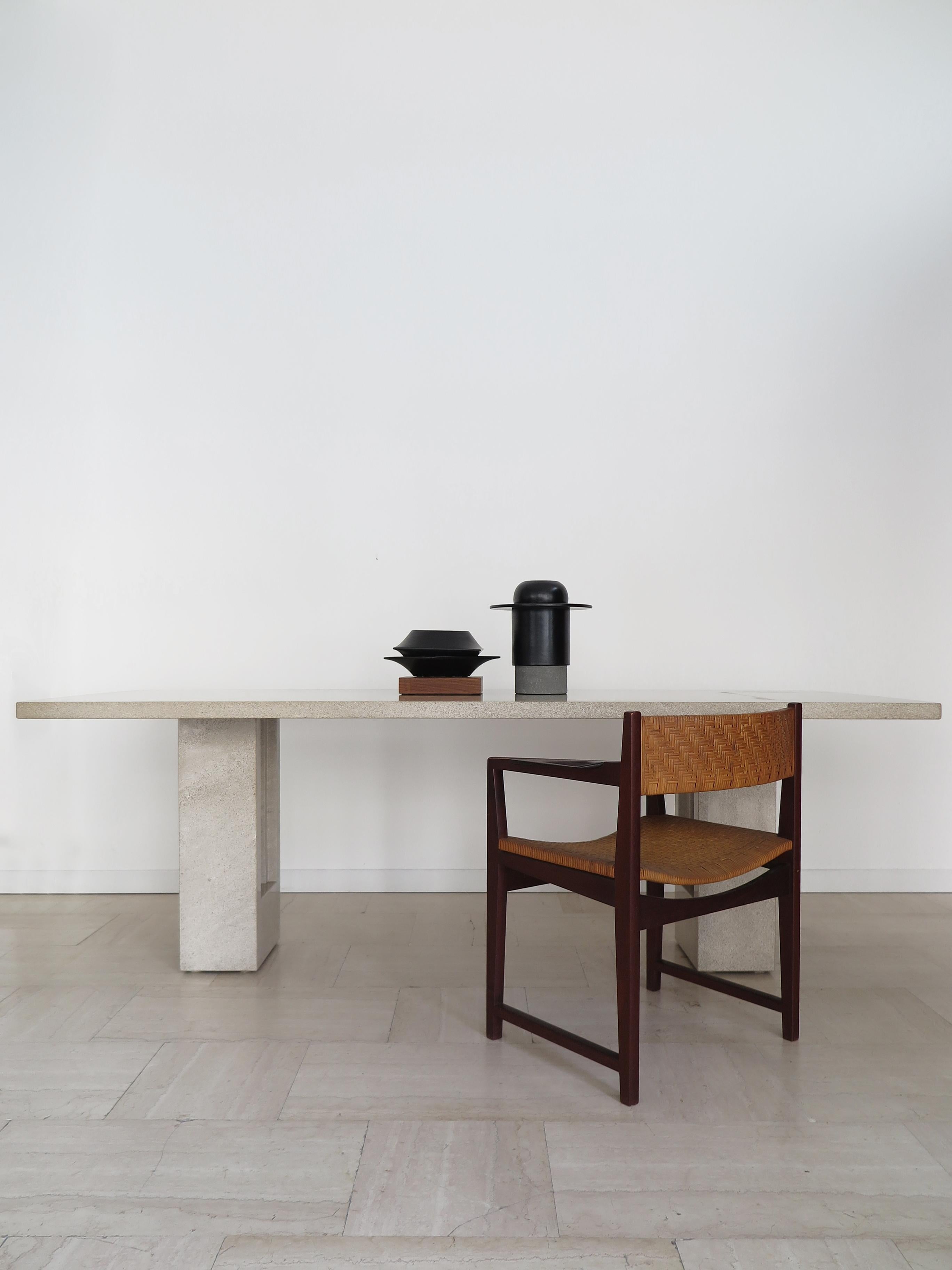 Italian rectangular marble dining table in warm gray color model Delfi designed by Carlo Scarpa and Marcel Brauer for Gavina composed of a thick top equipped with pins embedded in the sculptural bases for stability and security of the table,
