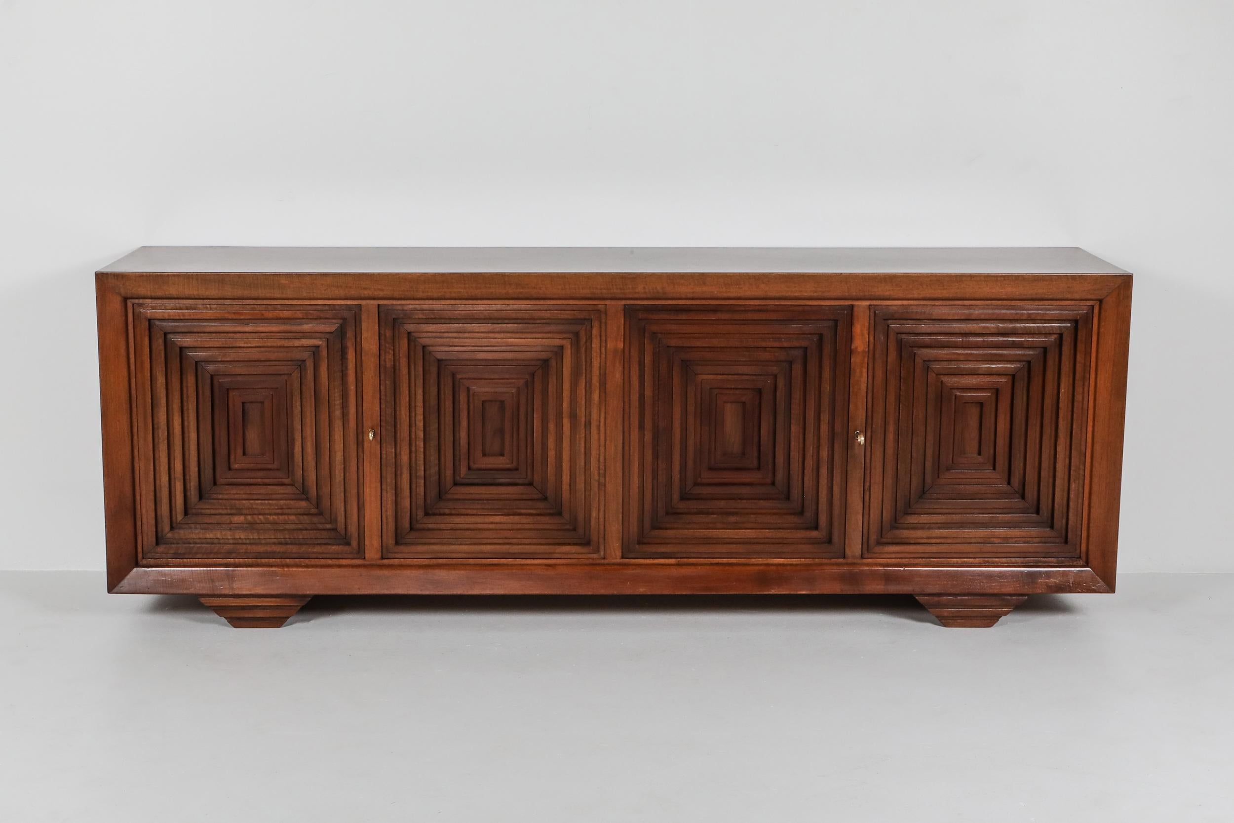 Carlo Scarpa, sideboard, solid walnut and walnut veneer, mid-century modern, brutalist

Similar to his architectural masterpiece, the Brion Vega cemetery, he uses graphical lines and contrasting depths into his work, like a never-ending