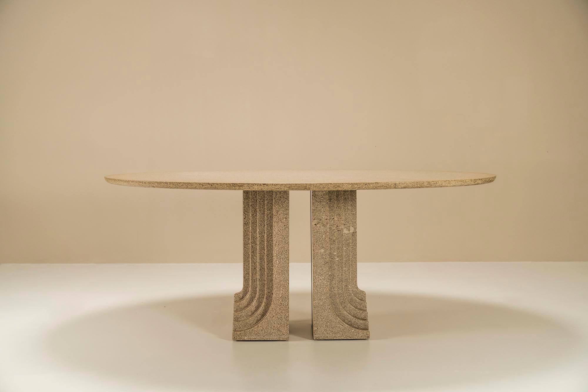 This Italian dining table from the 1970s exudes timeless elegance and beauty. It was designed by perhaps one of the prominent Italian modernist designers of the last century. What immediately catches the eye with this table are the architectural