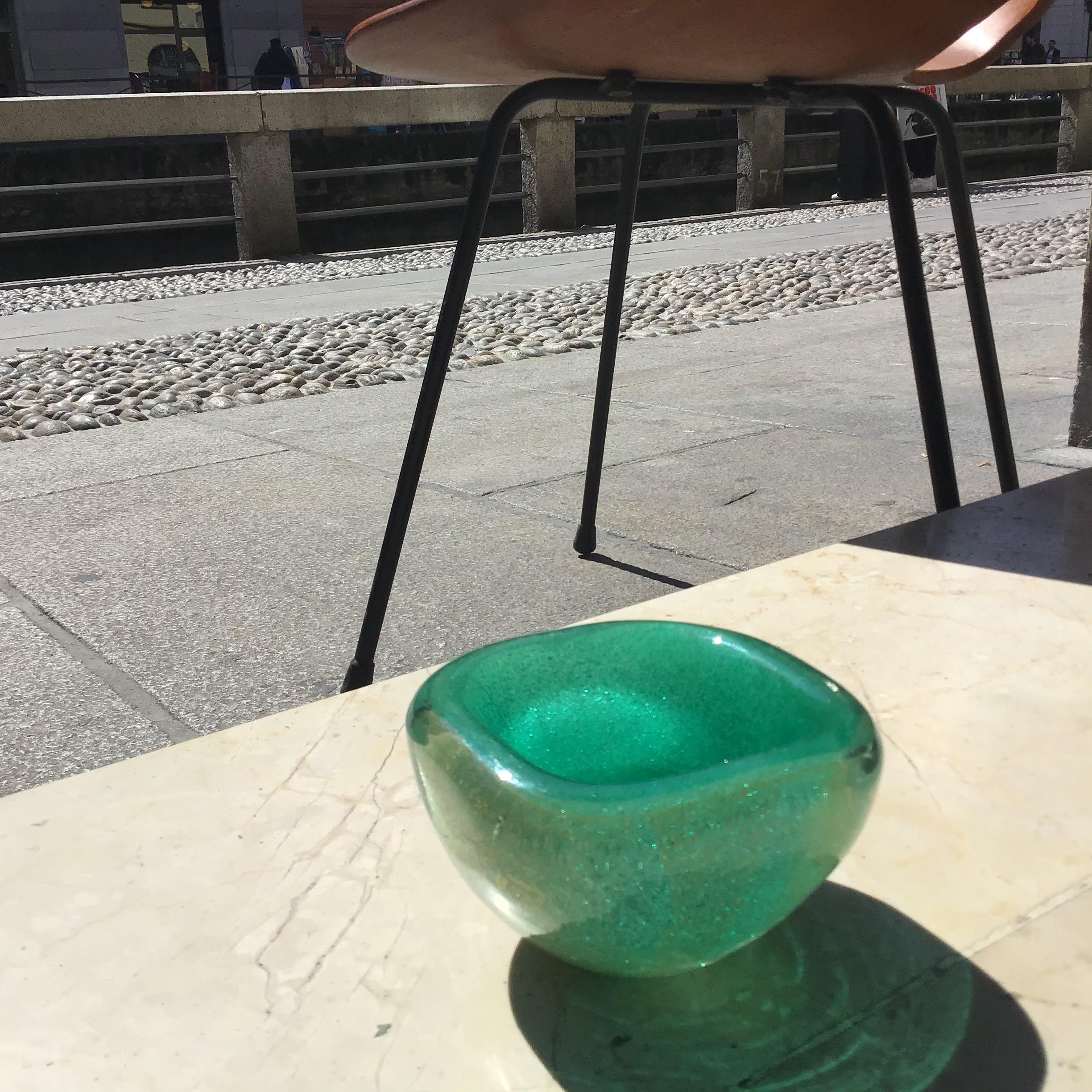 SPLENDID COUPLE CENTER TABLE in emerald green glass  pulegoso and gold brushstrokes signed in acid Venini MURANO in very good condition....
