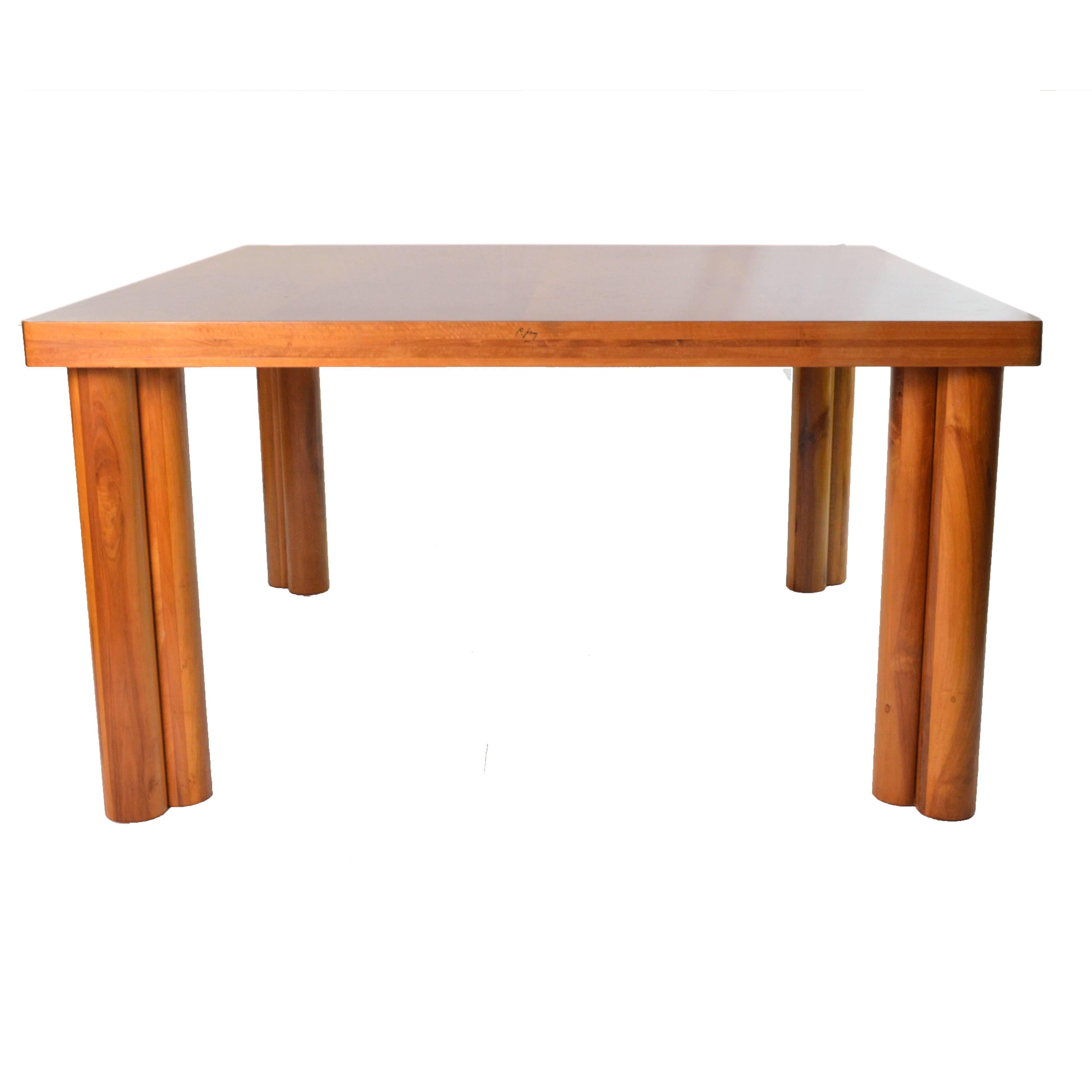 Table: Squared walnut wood Scuderia table by Carlo Scarpa, Bernini production, 1977. Models nos. 782. Walnut and pear multilayered tabletop. Double cylindrical multilayered walnut table legs. Signature “C. Scapra” on the side of the top, and mark