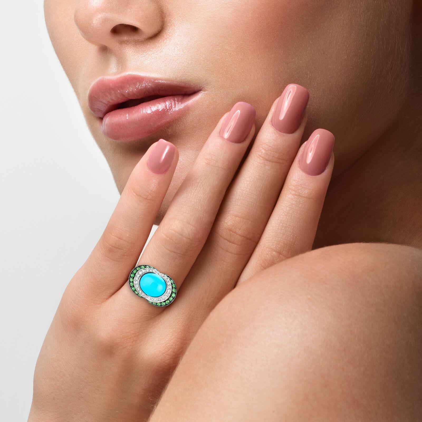 Carlo Viani Ring featuring 4 1/8 cts. Blue Turquoise, 1 1/3 cts. Green Tsavorite, 1/5 cts. White Diamonds set in 14K Yellow Gold

This sophisticated ring from Carlo Viani is the perfect gift for yourself or a loved one. The stand-out statement ring