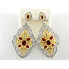 Boucles d'oreilles Carlo Viani avec rubis passion et topaze vanille serties en SLV